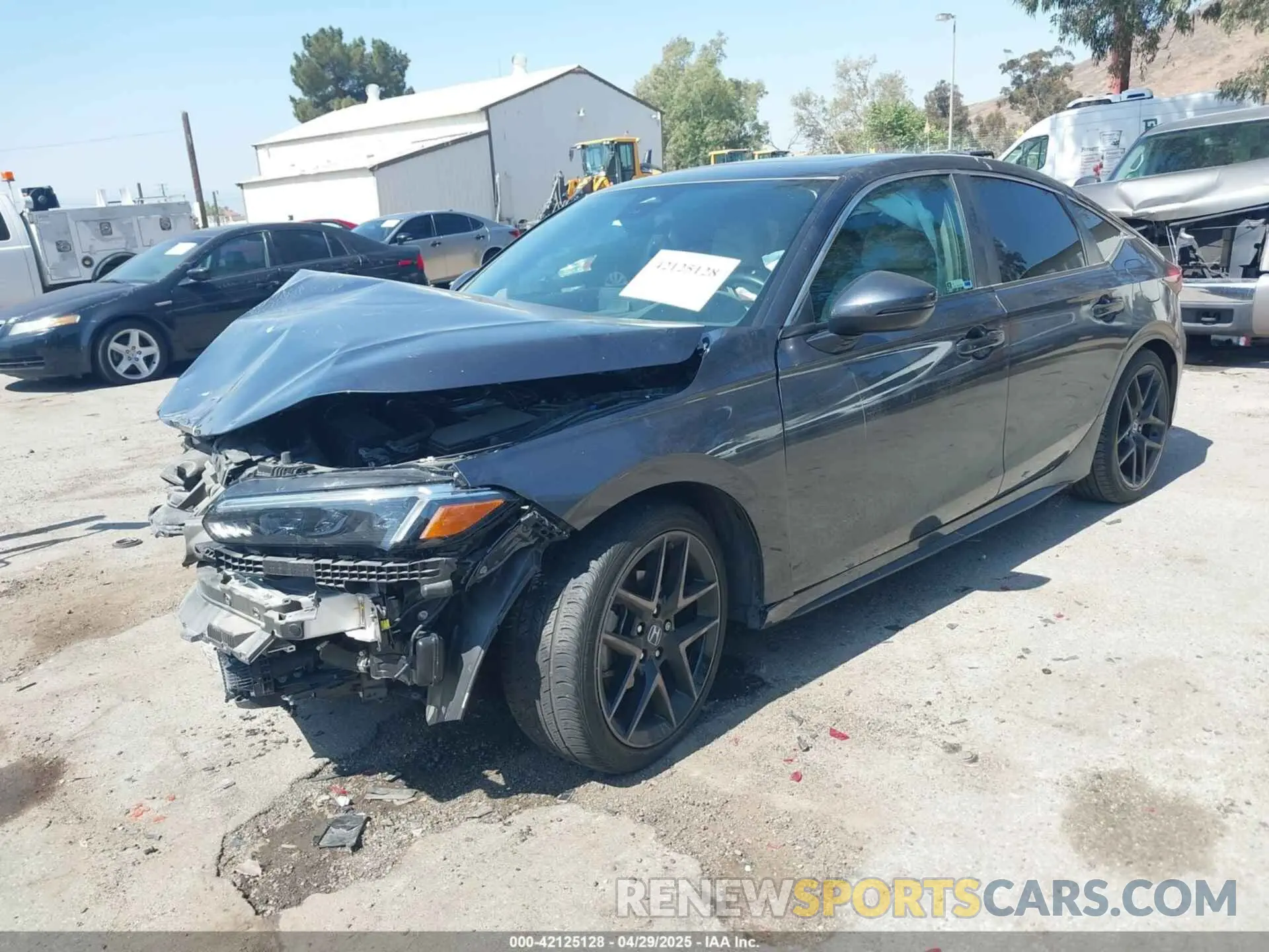 2 fotografías del automóvil dañado 19XFL1H88RE009258 HONDA CIVIC 2024