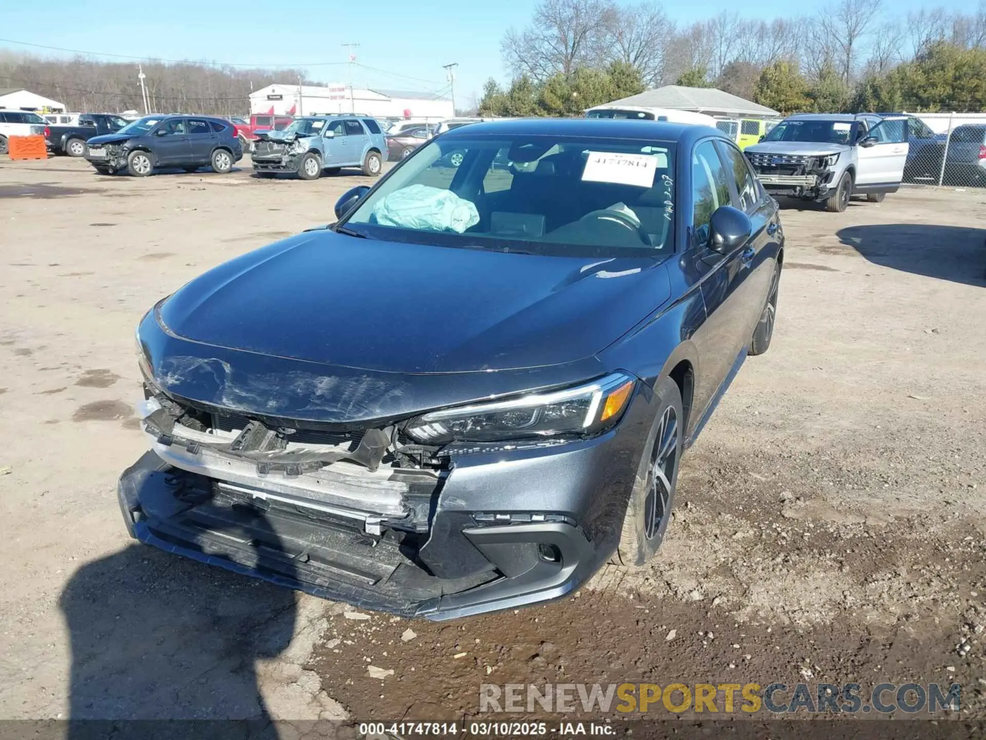 2 fotografías del automóvil dañado 19XFL2H59RE008308 HONDA CIVIC 2024