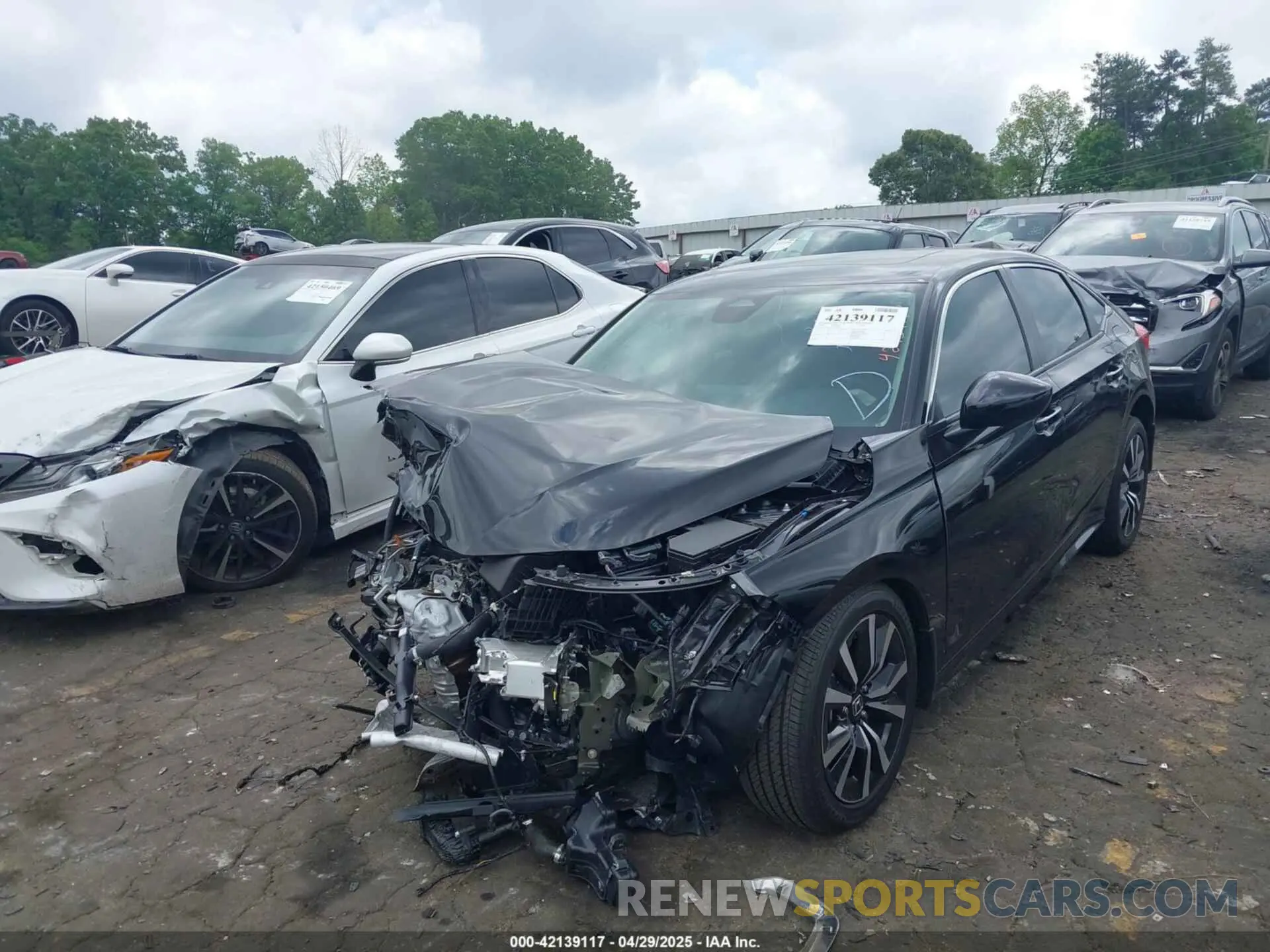 2 fotografías del automóvil dañado 2HGFE1F77RH338897 HONDA CIVIC 2024