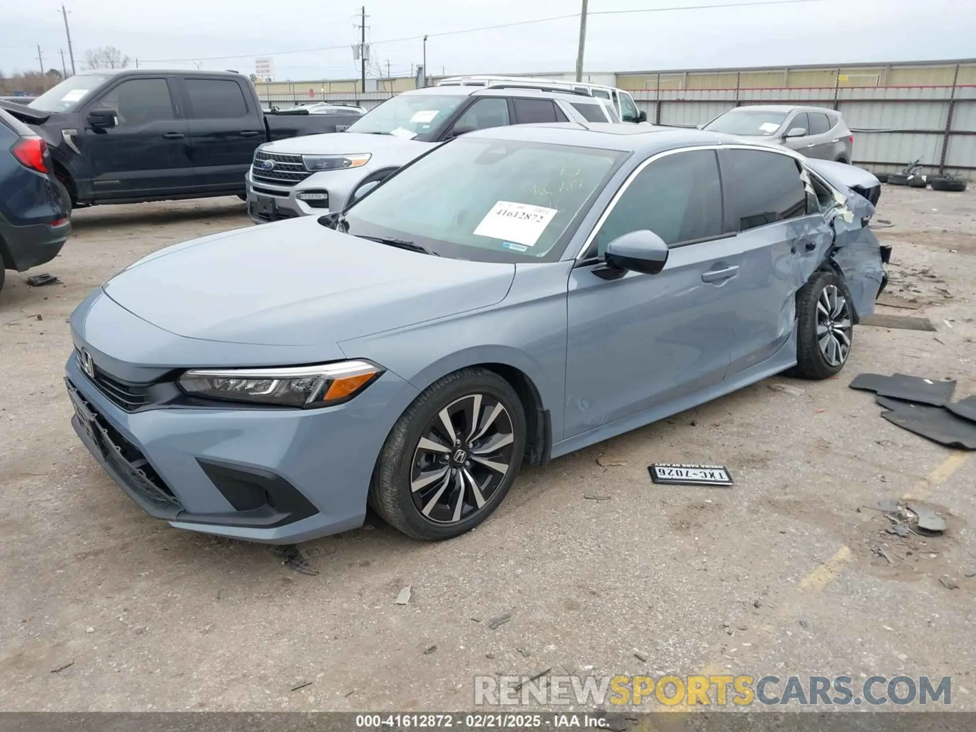 2 fotografías del automóvil dañado 2HGFE1F7XRH319650 HONDA CIVIC 2024