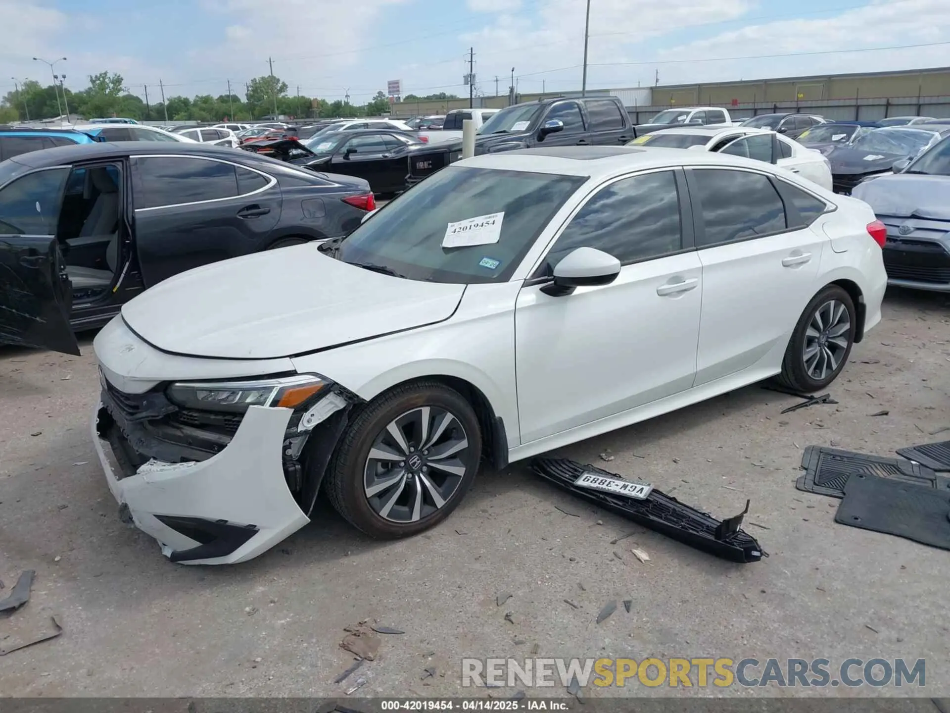 2 fotografías del automóvil dañado 2HGFE1F7XRH323682 HONDA CIVIC 2024
