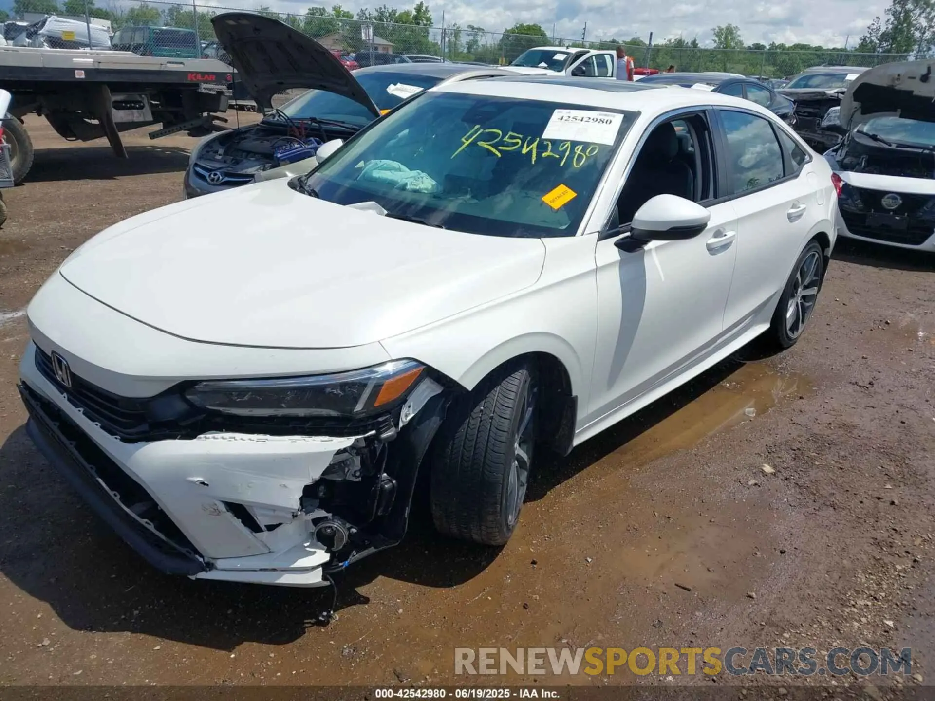 2 fotografías del automóvil dañado 2HGFE1F90RH324471 HONDA CIVIC 2024