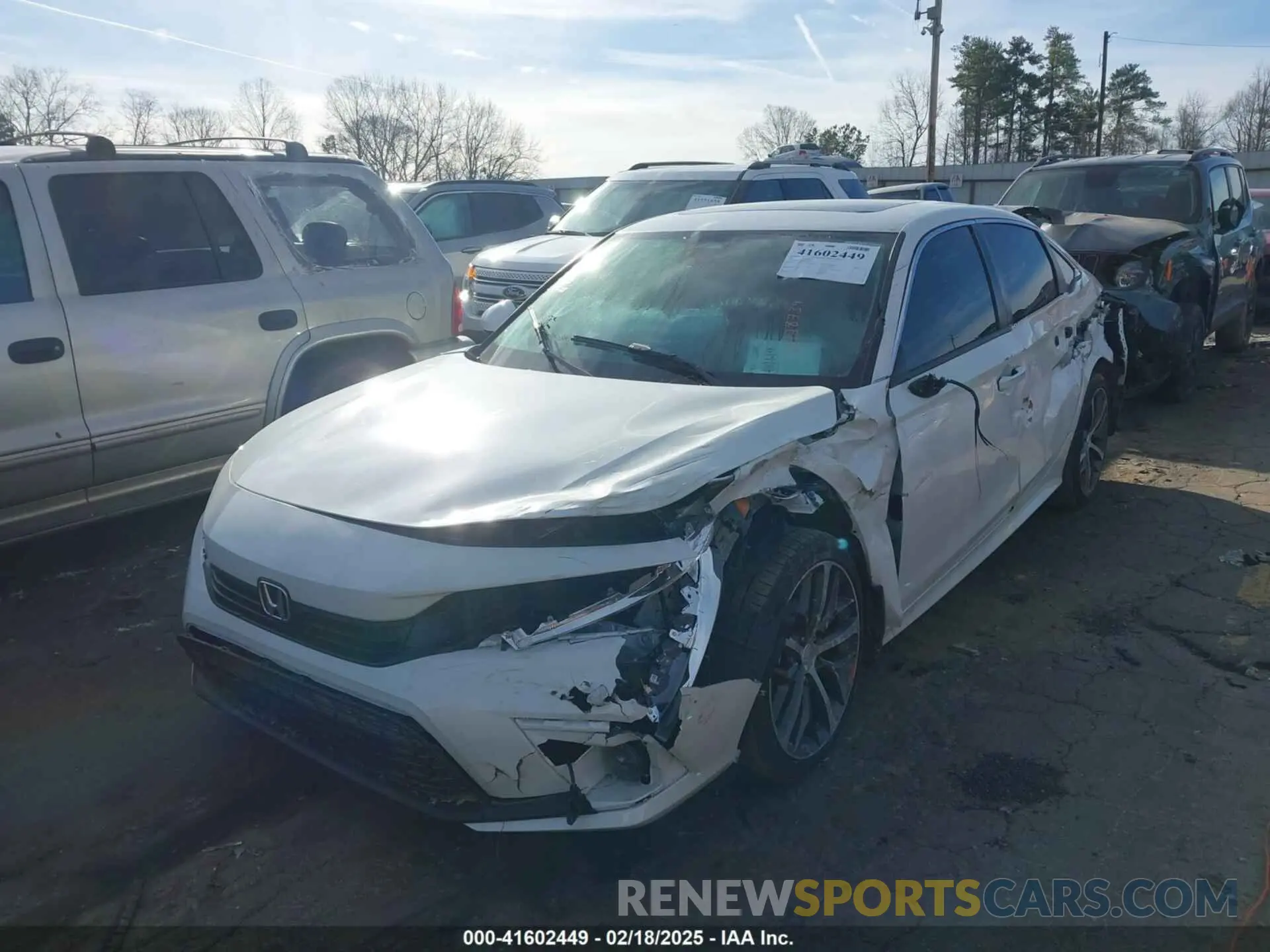2 fotografías del automóvil dañado 2HGFE1F93RH328739 HONDA CIVIC 2024