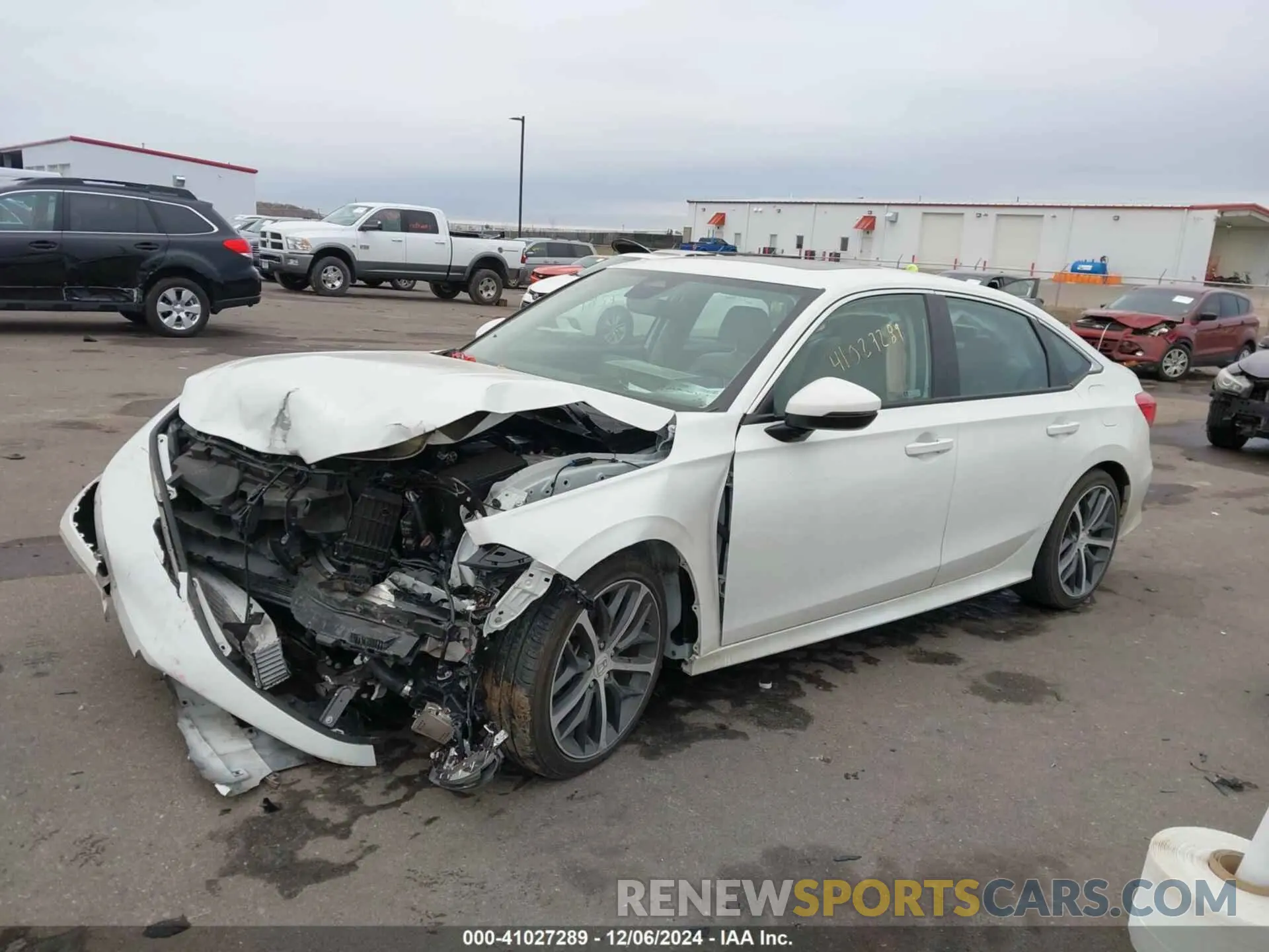 2 fotografías del automóvil dañado 2HGFE1F94RH306104 HONDA CIVIC 2024
