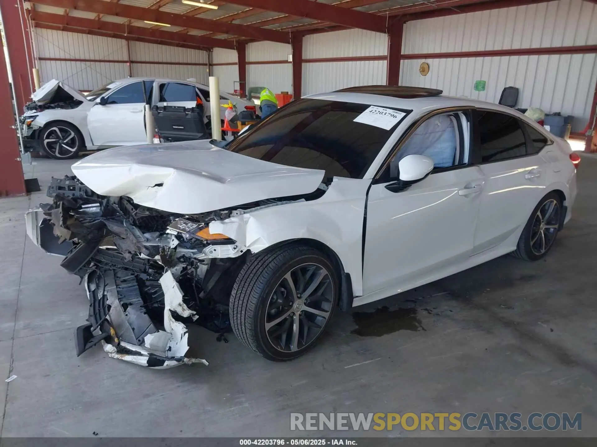 2 fotografías del automóvil dañado 2HGFE1F97RH307568 HONDA CIVIC 2024