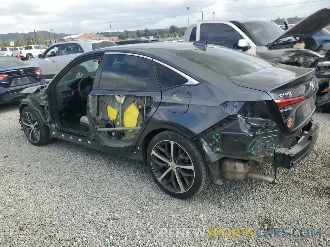 2 fotografías del automóvil dañado 2HGFE1F98RH336464 HONDA CIVIC 2024