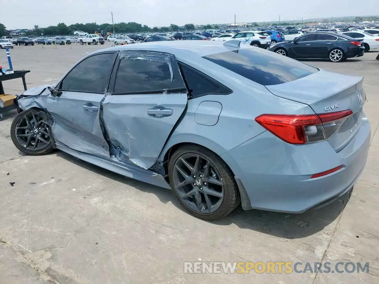 2 fotografías del automóvil dañado 2HGFE2F50RH538279 HONDA CIVIC 2024