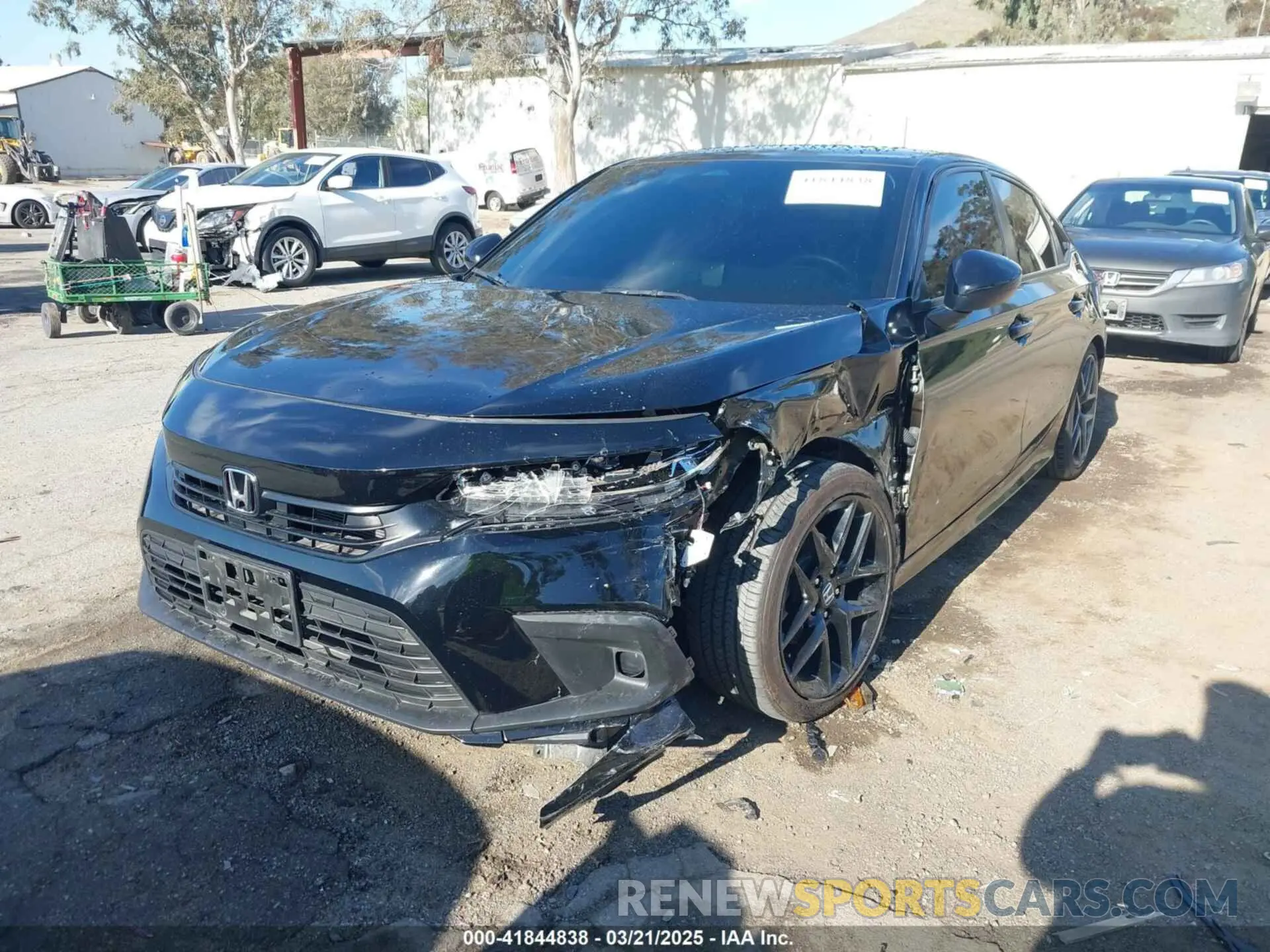 2 fotografías del automóvil dañado 2HGFE2F52RH572255 HONDA CIVIC 2024