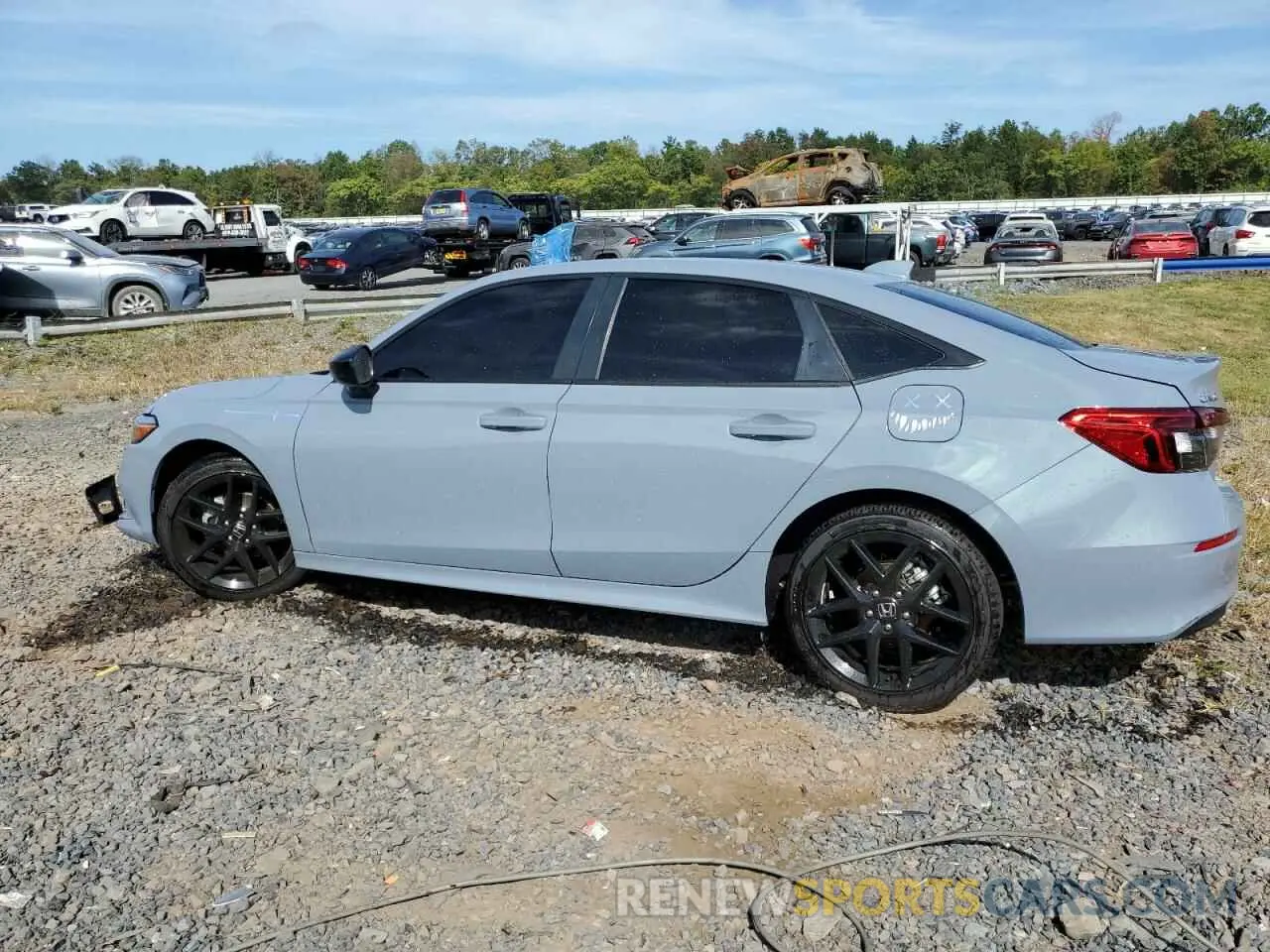 2 fotografías del automóvil dañado 2HGFE2F57RH585812 HONDA CIVIC 2024