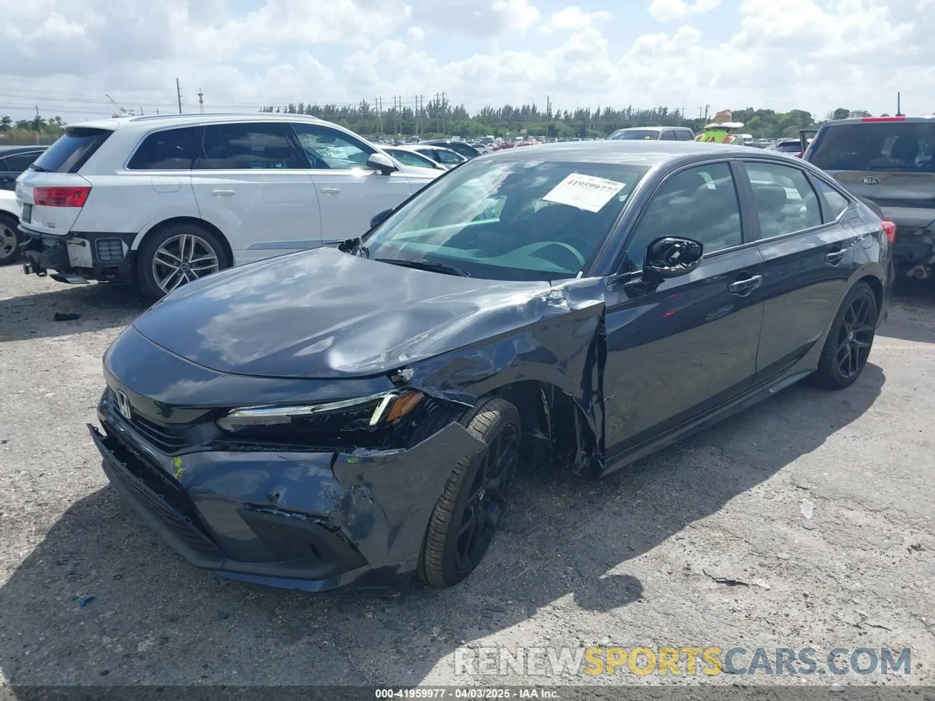 2 fotografías del automóvil dañado 2HGFE2F59RH594821 HONDA CIVIC 2024
