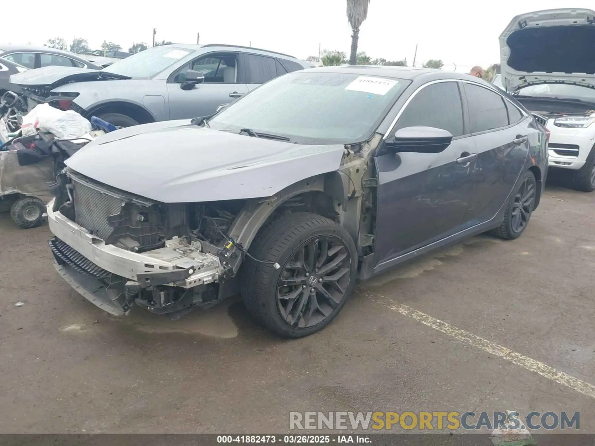 2 fotografías del automóvil dañado 2HGFC1E52LH700874 HONDA CIVIC SI 2020
