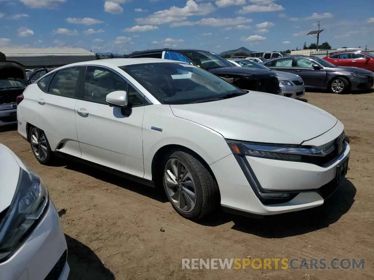 4 fotografías del automóvil dañado JHMZC5F10KC004142 HONDA CLARITY 2019