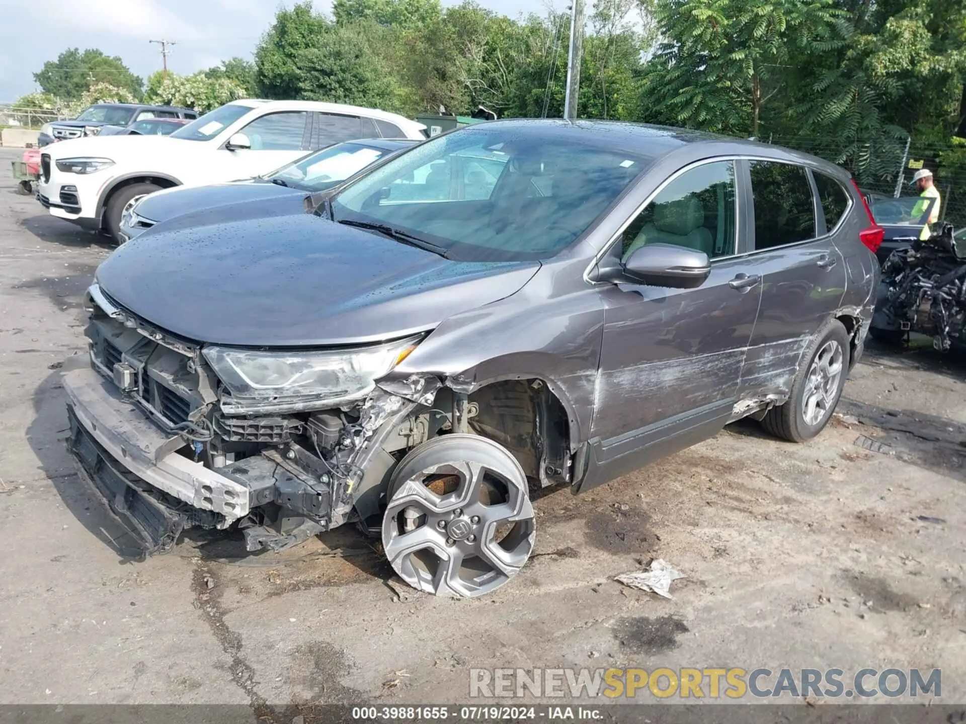 2 fotografías del automóvil dañado 2HKRW1H87HH506347 HONDA CR-V 2017