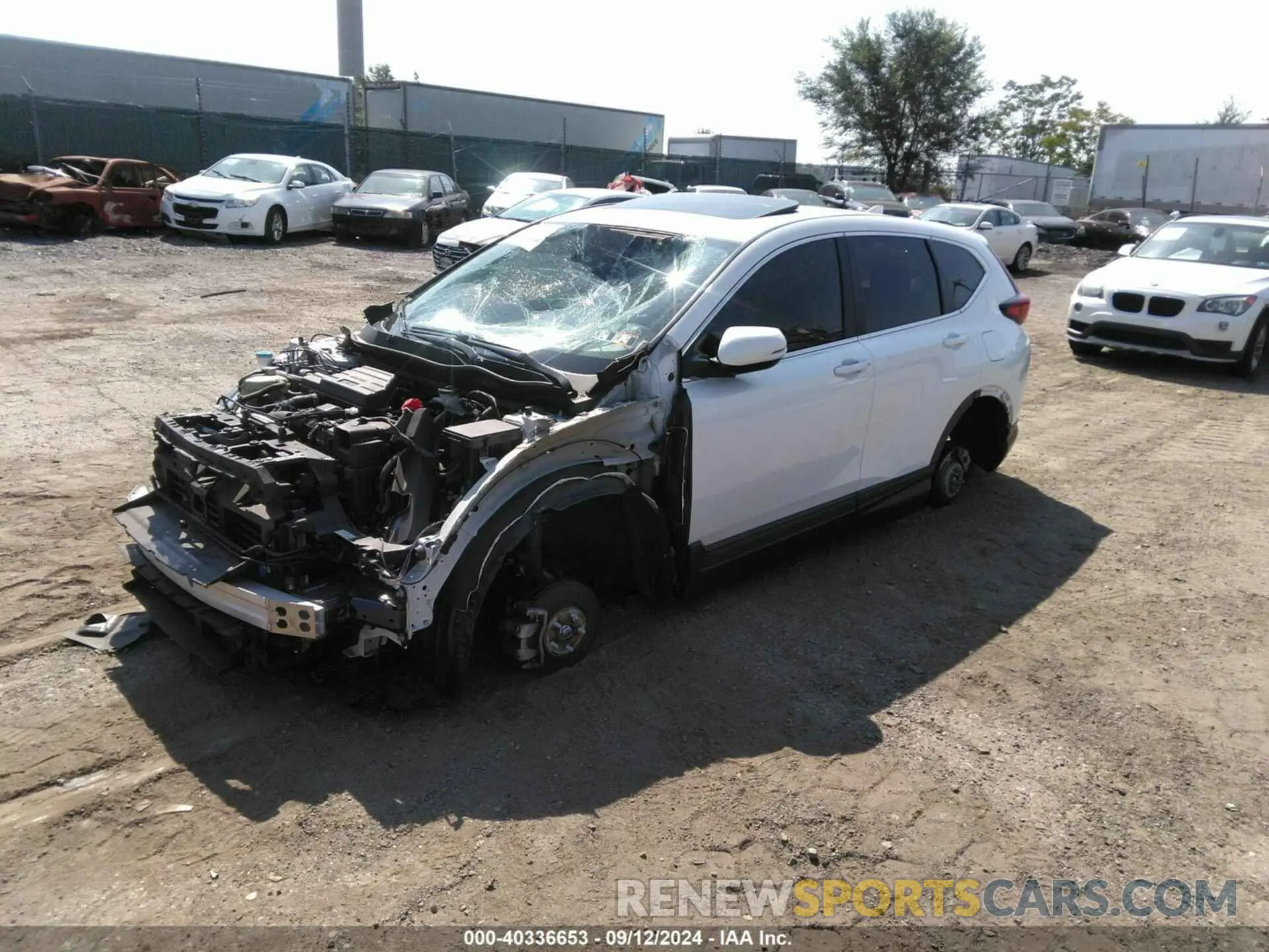 2 fotografías del automóvil dañado 2HKRW2H57HH615502 HONDA CR-V 2017