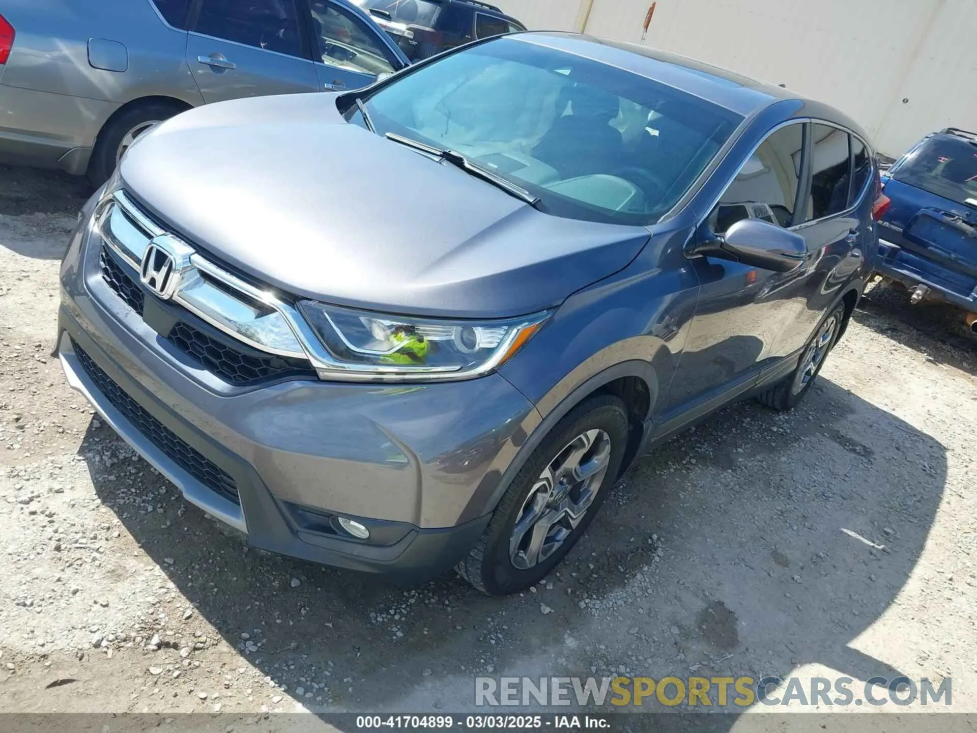 2 fotografías del automóvil dañado 5J6RW1H50KA011180 HONDA CR-V 2019