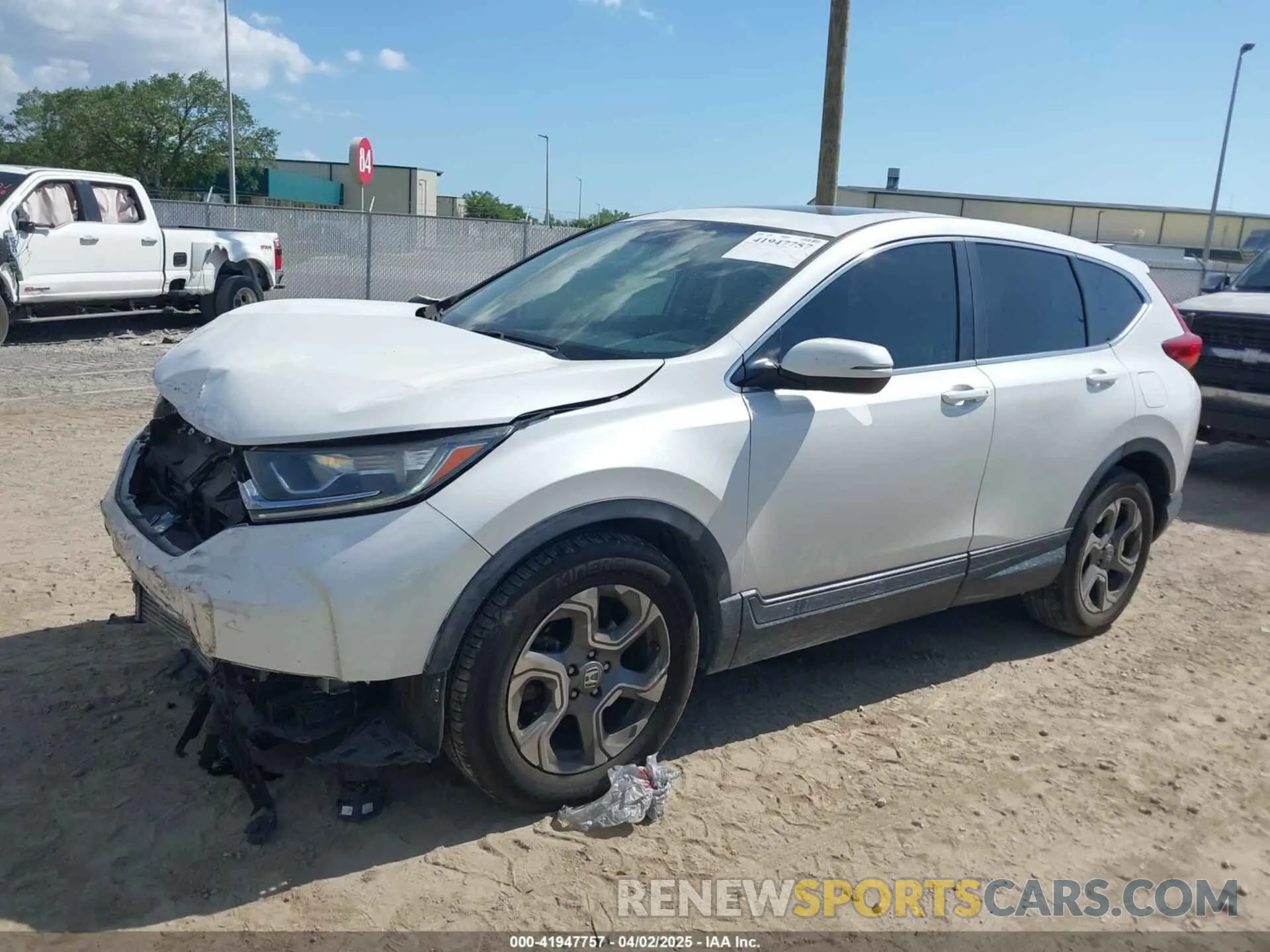 2 fotografías del automóvil dañado 5J6RW1H5XKL008095 HONDA CR-V 2019