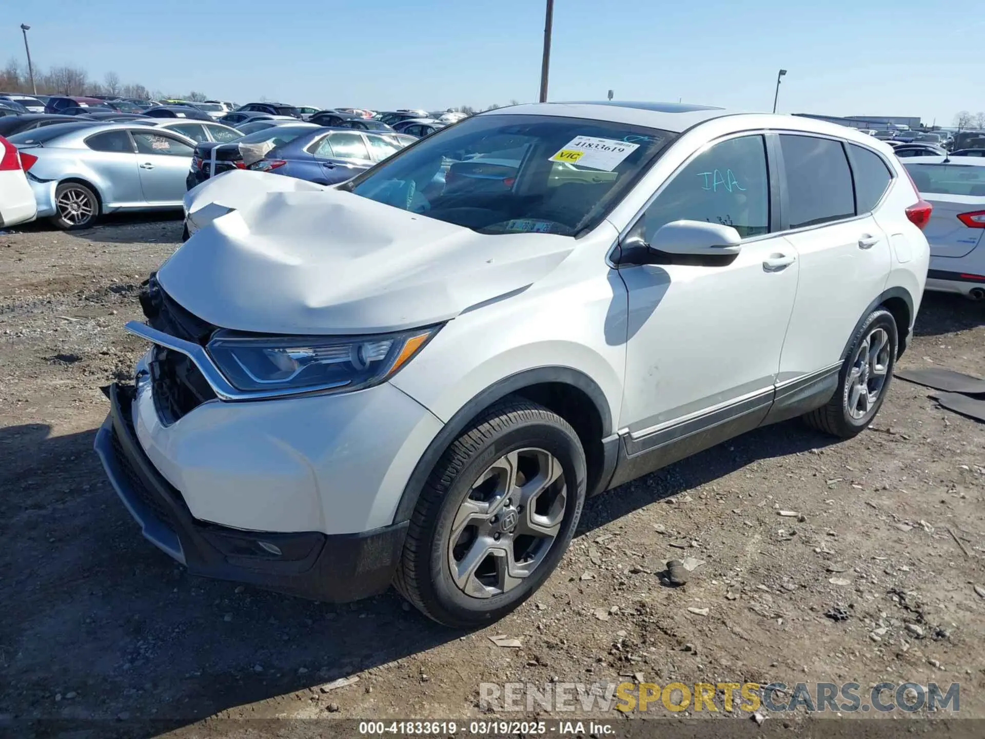 2 fotografías del automóvil dañado 5J6RW2H57KL030092 HONDA CR-V 2019