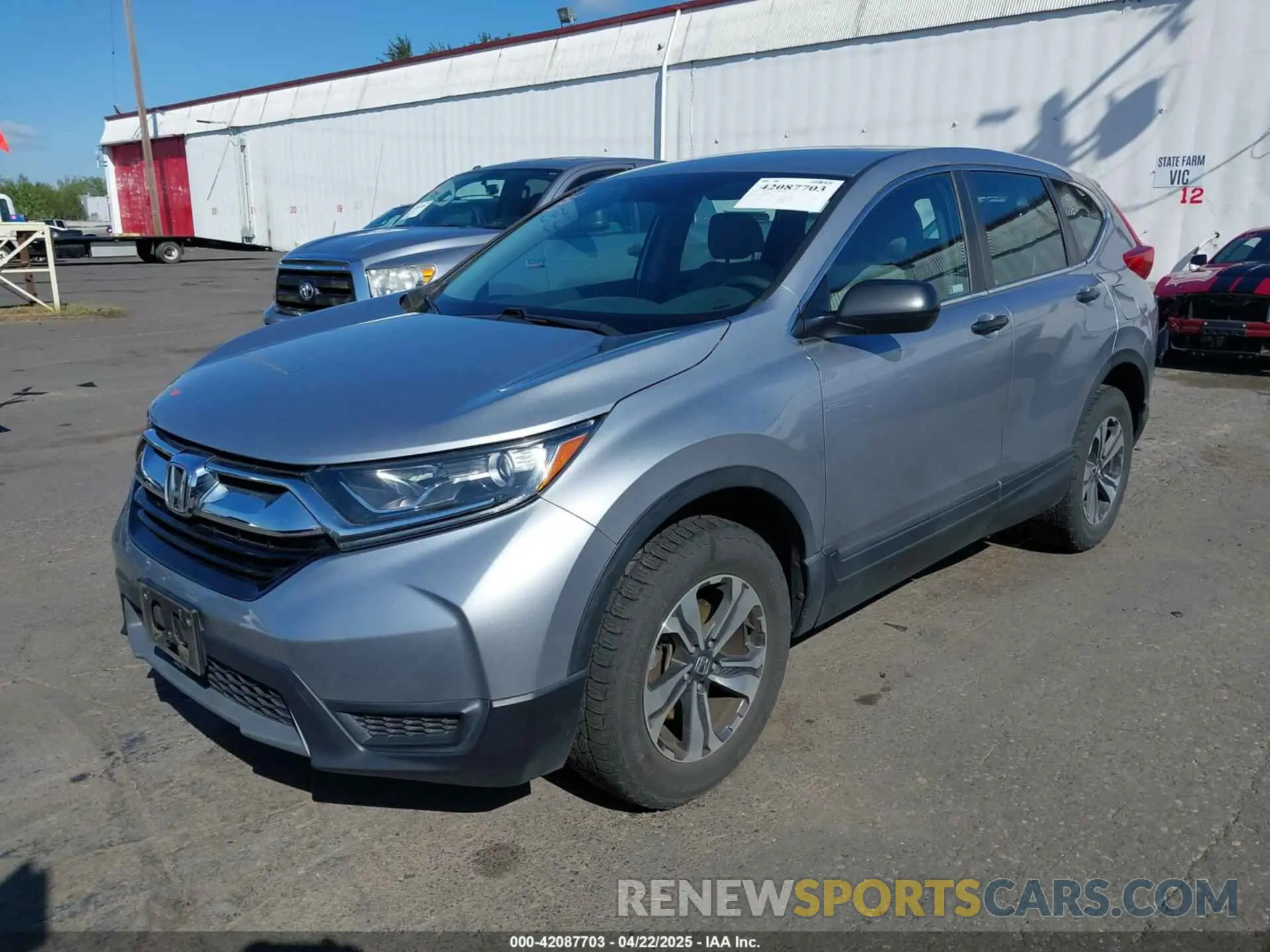 2 fotografías del automóvil dañado 5J6RW6H31KL003721 HONDA CR-V 2019