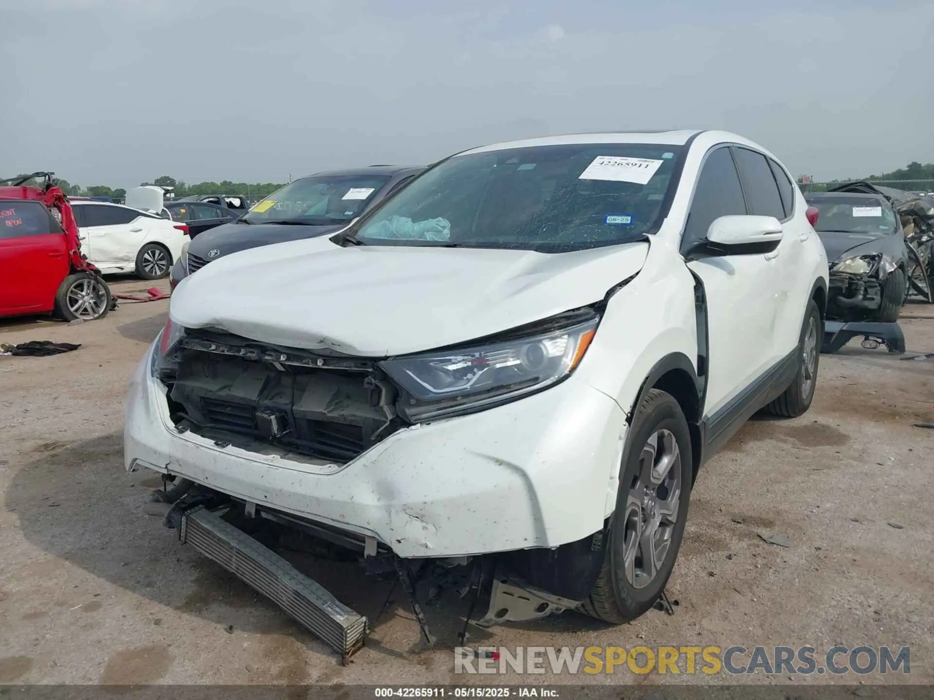 2 fotografías del automóvil dañado 7FARW1H51KE019516 HONDA CR-V 2019