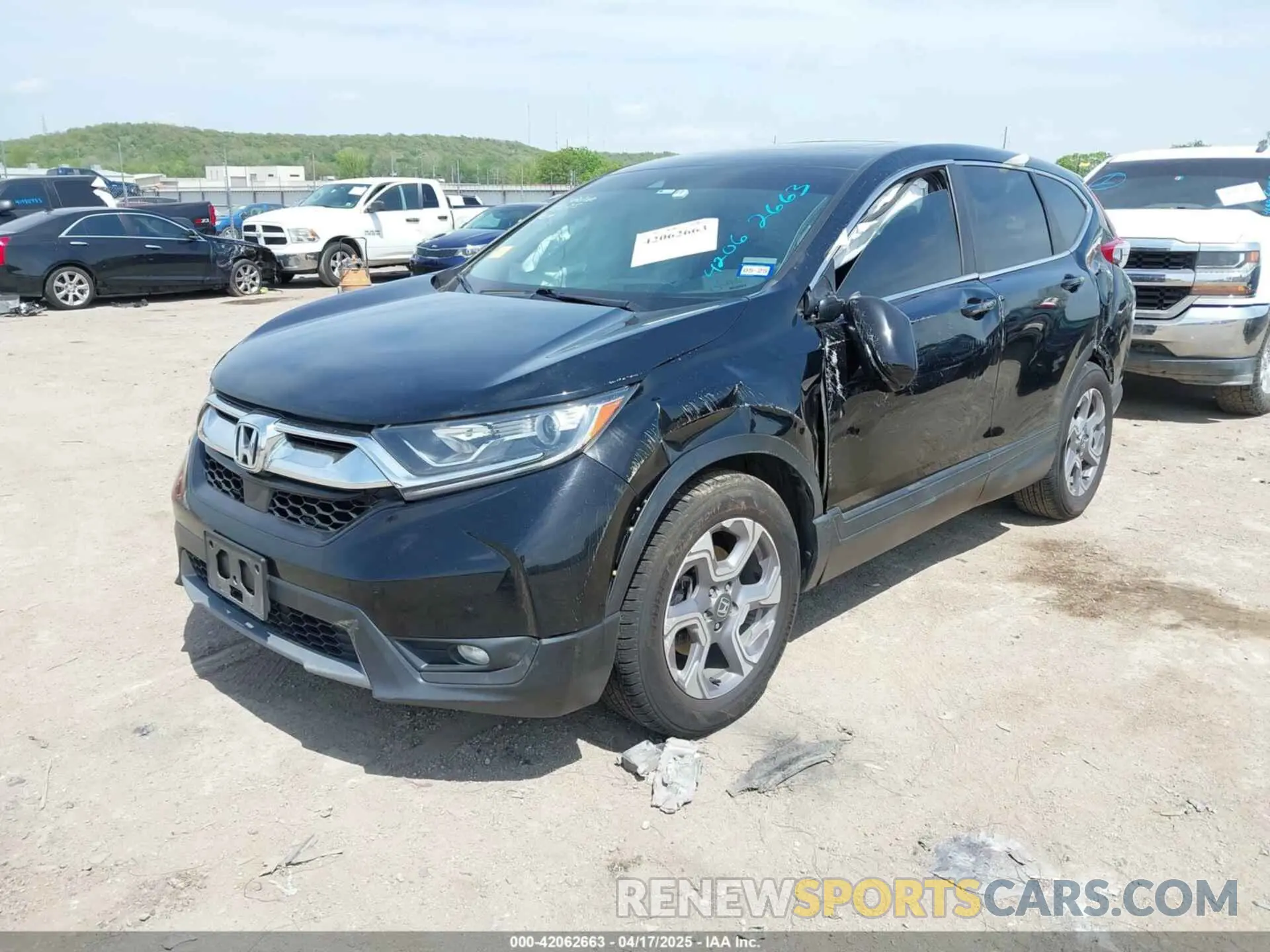 2 fotografías del automóvil dañado 7FARW1H58KE032263 HONDA CR-V 2019