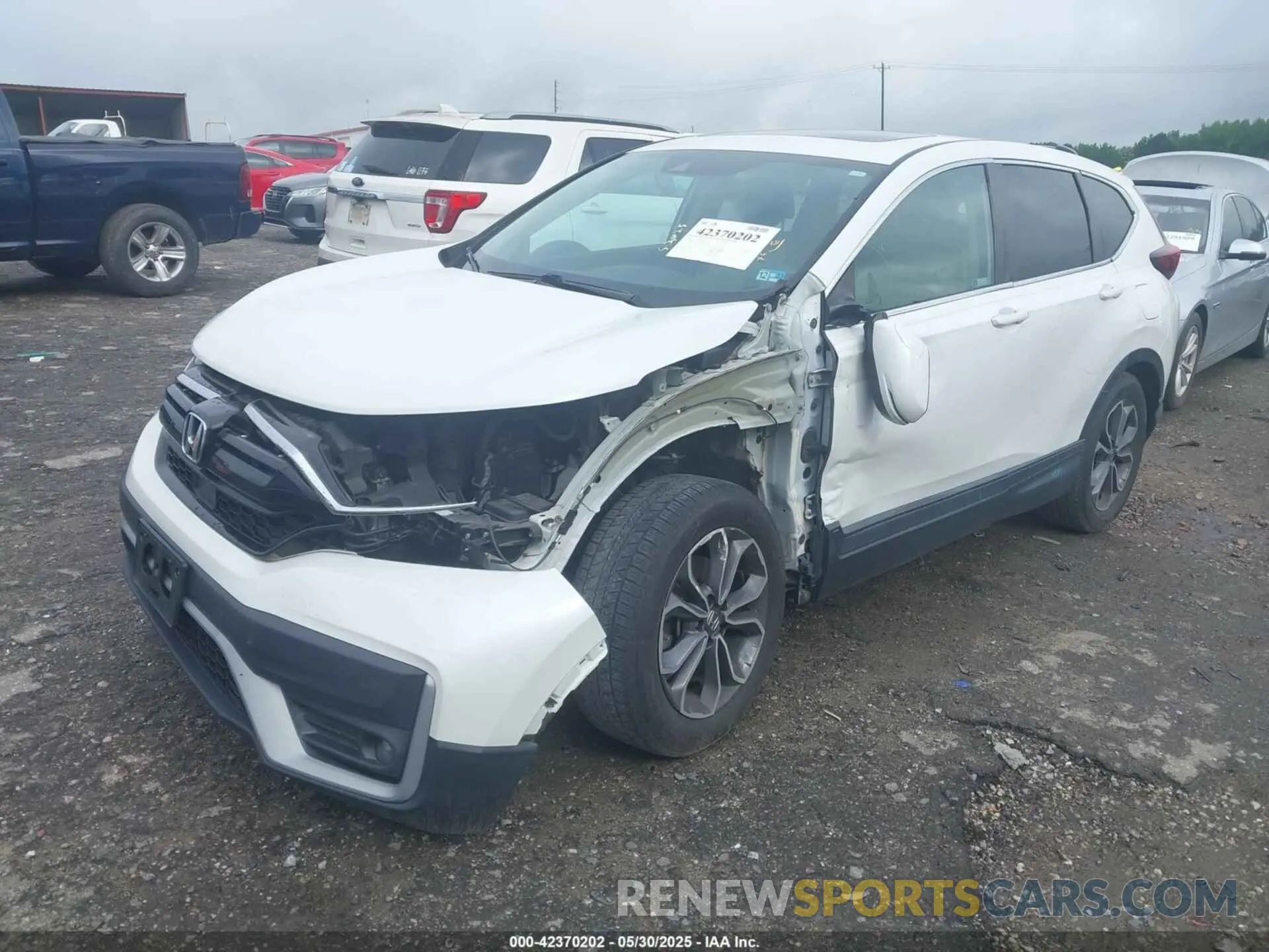 2 fotografías del automóvil dañado 2HKRW1H57LH409227 HONDA CR-V 2020