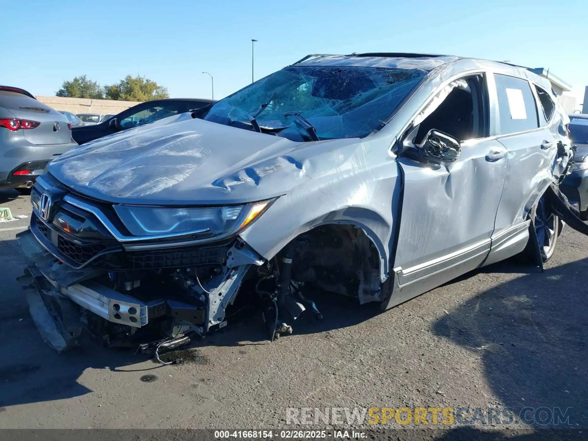 2 fotografías del automóvil dañado 5J6RW1H5XNA005441 HONDA CR-V 2022
