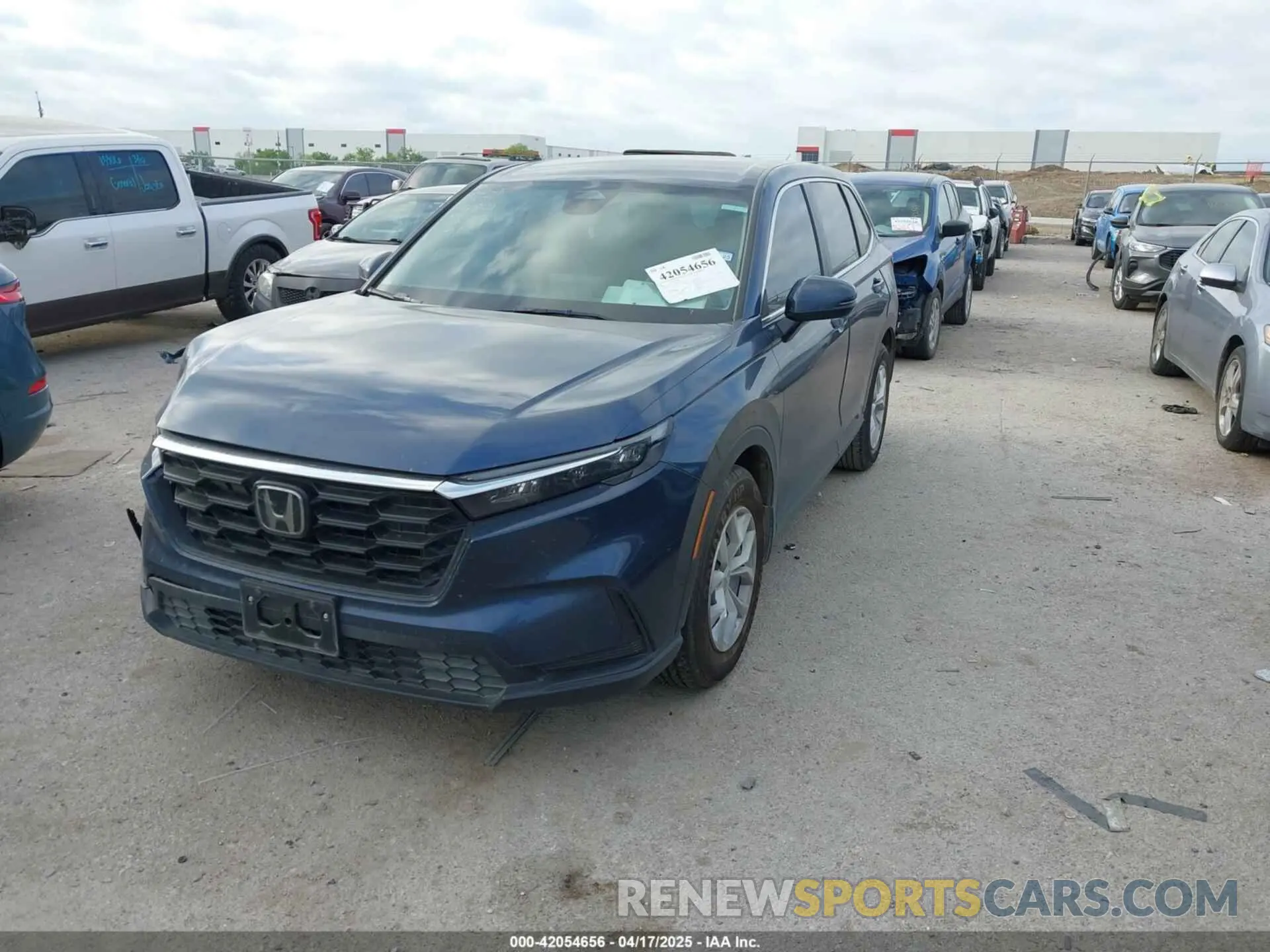 2 fotografías del automóvil dañado 2HKRS3H23PH308513 HONDA CR-V 2023