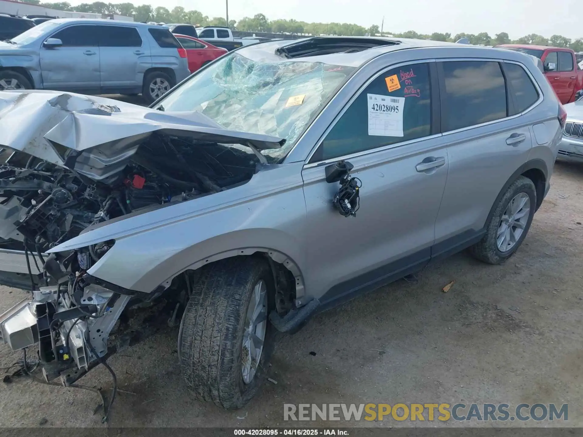 2 fotografías del automóvil dañado 2HKRS3H75PH302319 HONDA CR-V 2023