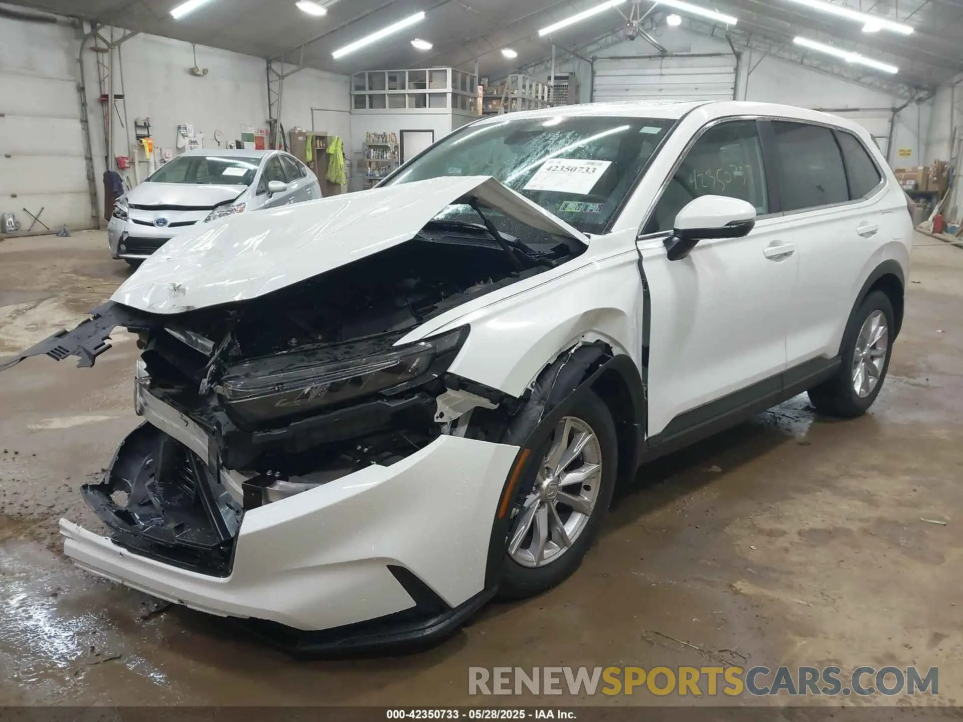 2 fotografías del automóvil dañado 2HKRS4H75PH421025 HONDA CR-V 2023