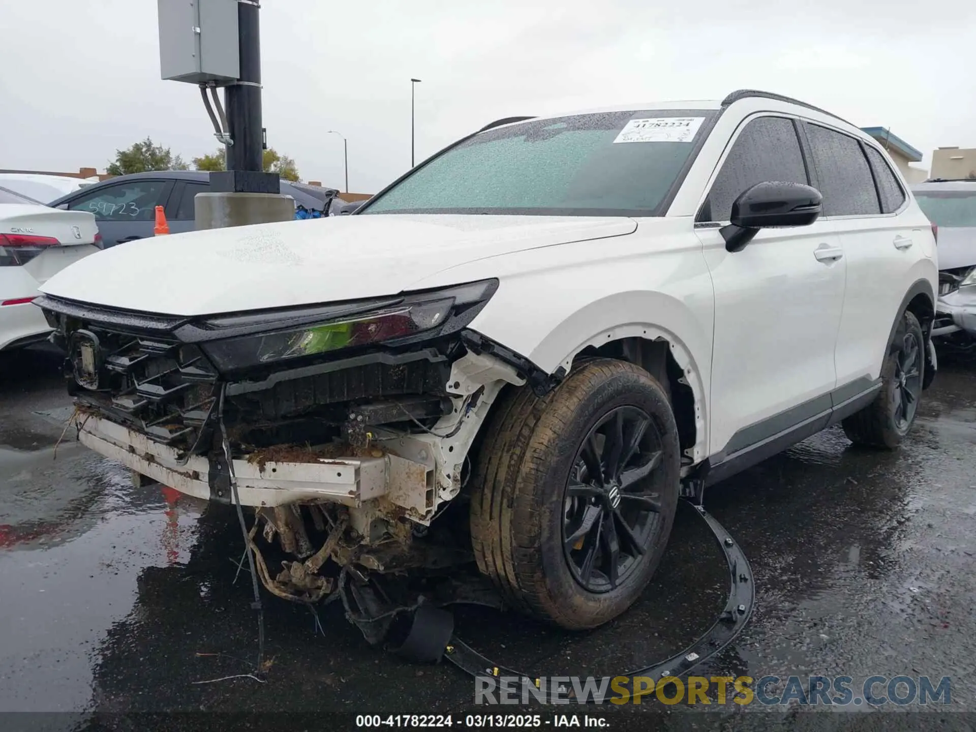 2 fotografías del automóvil dañado 2HKRS5H59PH713426 HONDA CR-V 2023