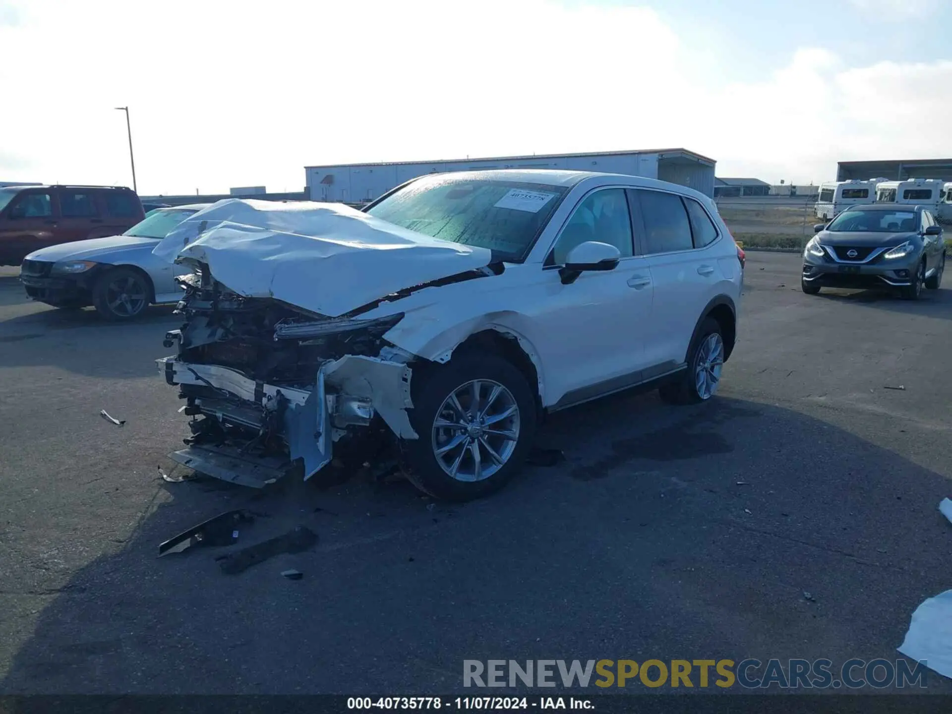 2 fotografías del automóvil dañado 5J6RS4H70PL010539 HONDA CR-V 2023