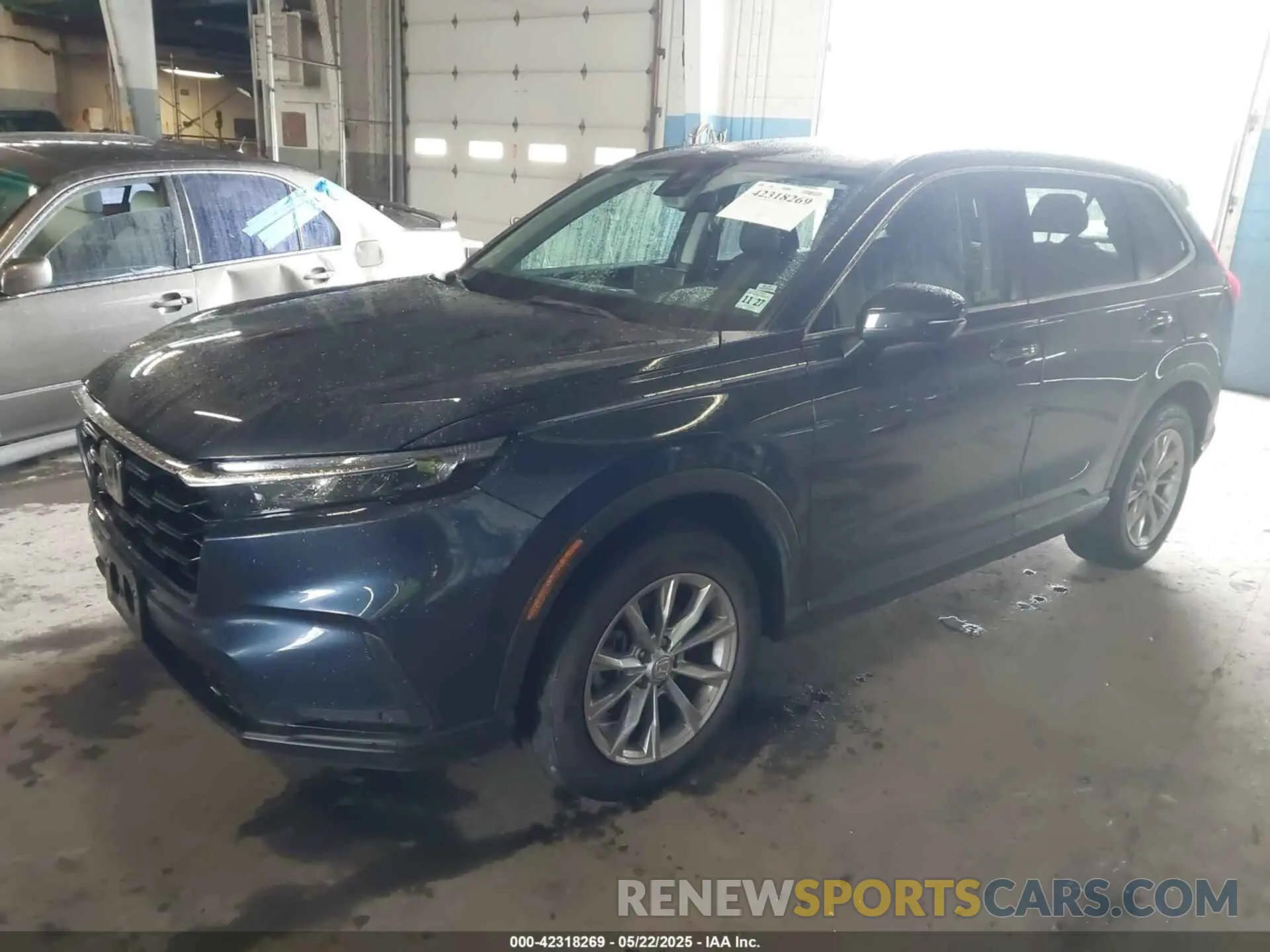 2 fotografías del automóvil dañado 7FARS4H77PE006906 HONDA CR-V 2023