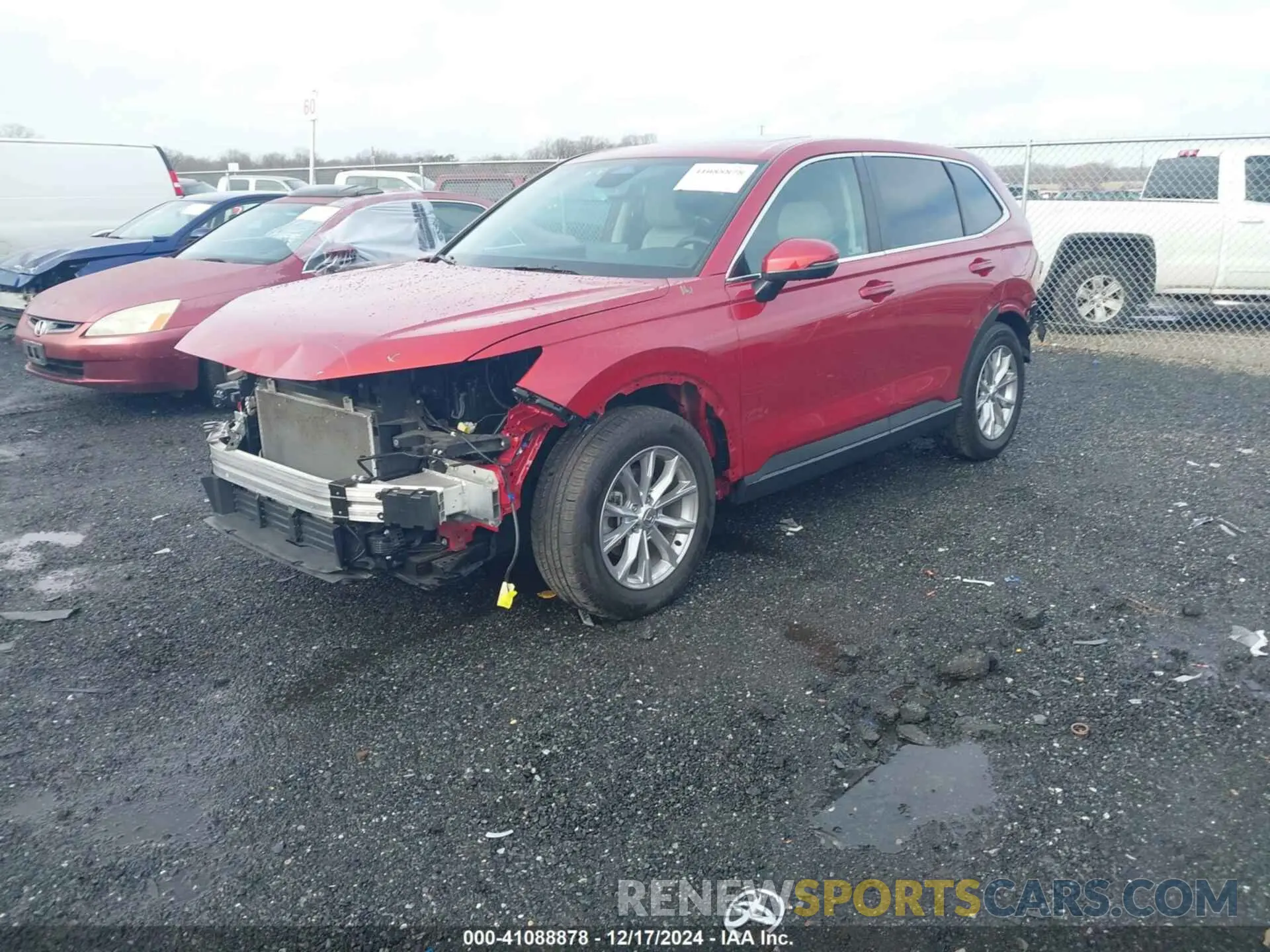 2 fotografías del automóvil dañado 2HKRS3H40RH301989 HONDA CR-V 2024