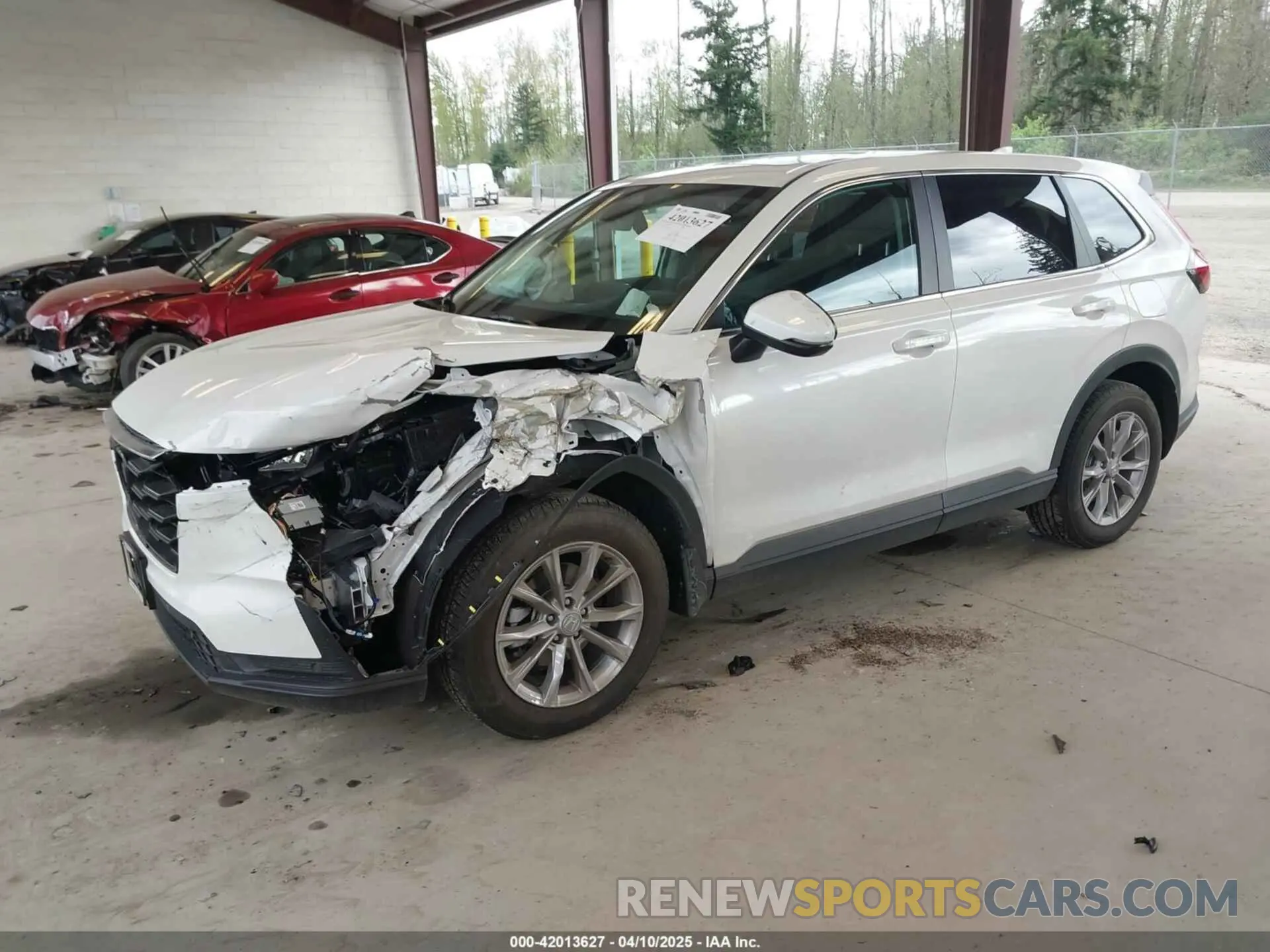 2 fotografías del automóvil dañado 2HKRS4H72SH440284 HONDA CR-V 2025