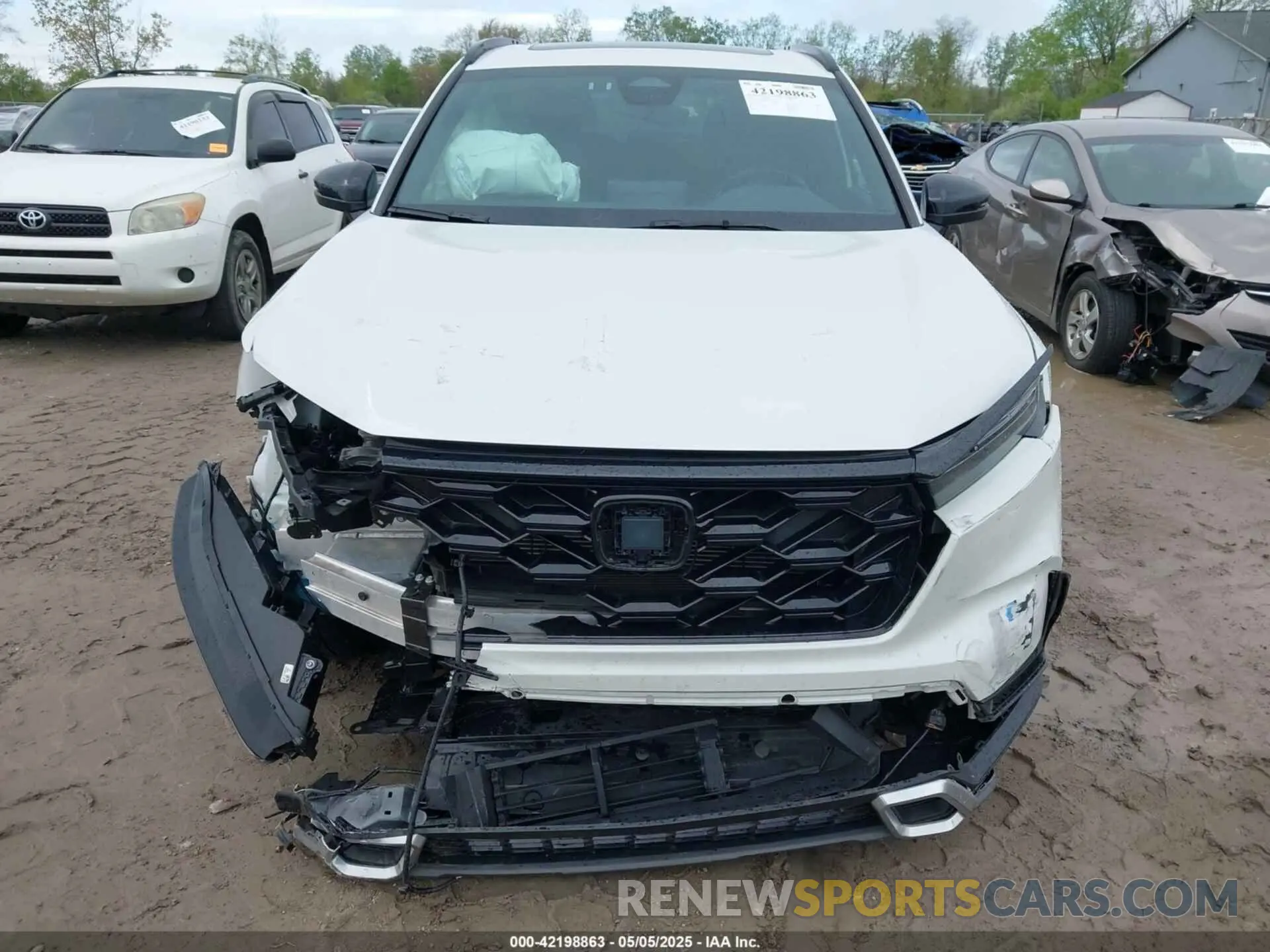 11 fotografías del automóvil dañado 2HKRS6H90PH804285 HONDA CR-V HYBRID 2023