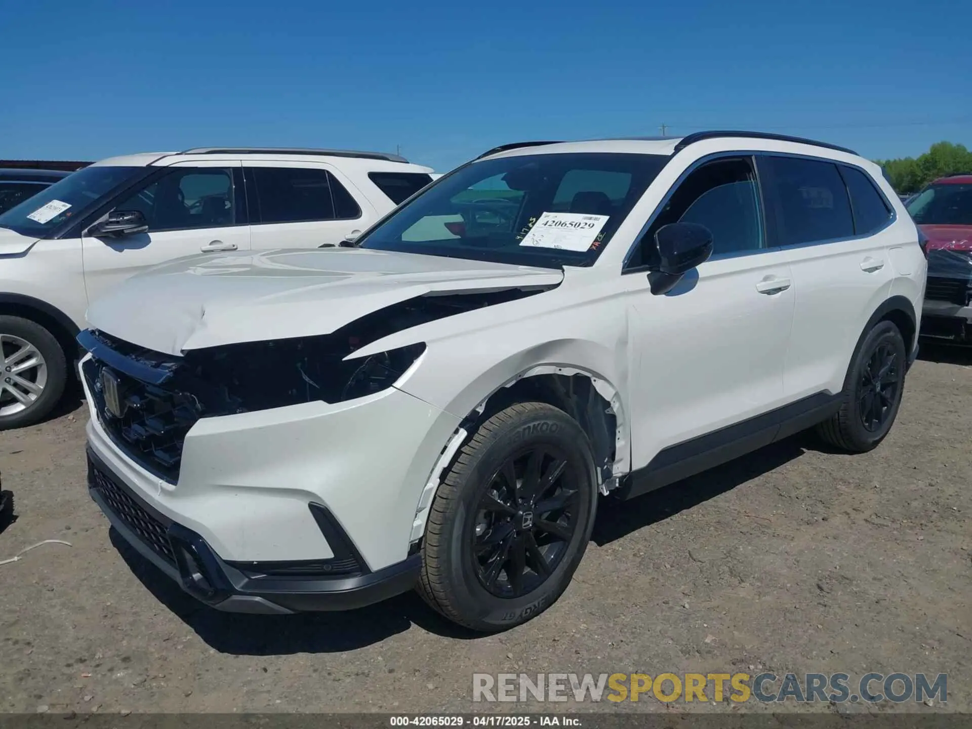 2 fotografías del automóvil dañado 5J6RS5H87SL009122 HONDA CR-V HYBRID 2025