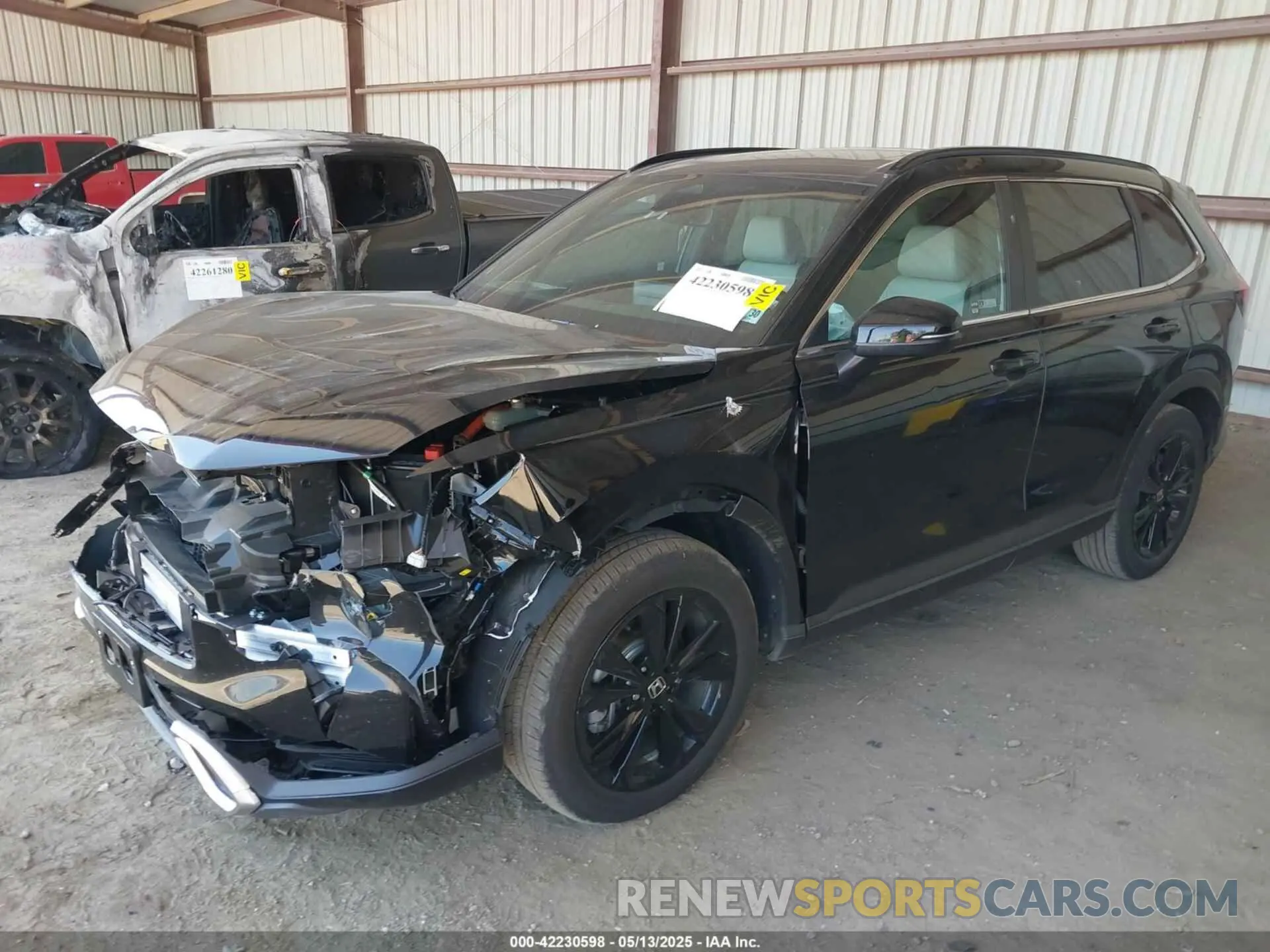 2 fotografías del automóvil dañado 5J6RS6H97SL031958 HONDA CR-V HYBRID 2025