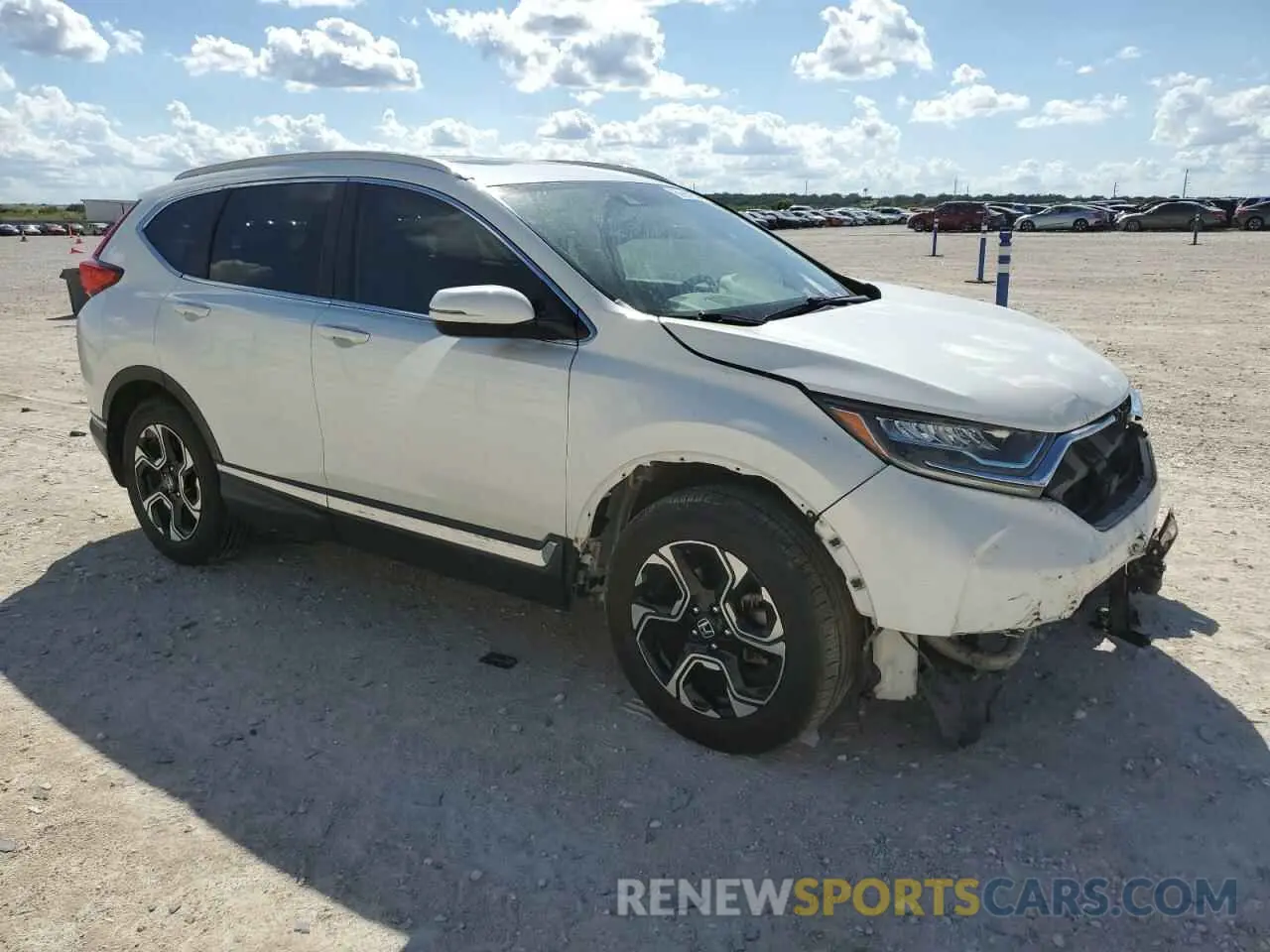 4 fotografías del automóvil dañado 5J6RW1H90JL014120 HONDA CRV 2018