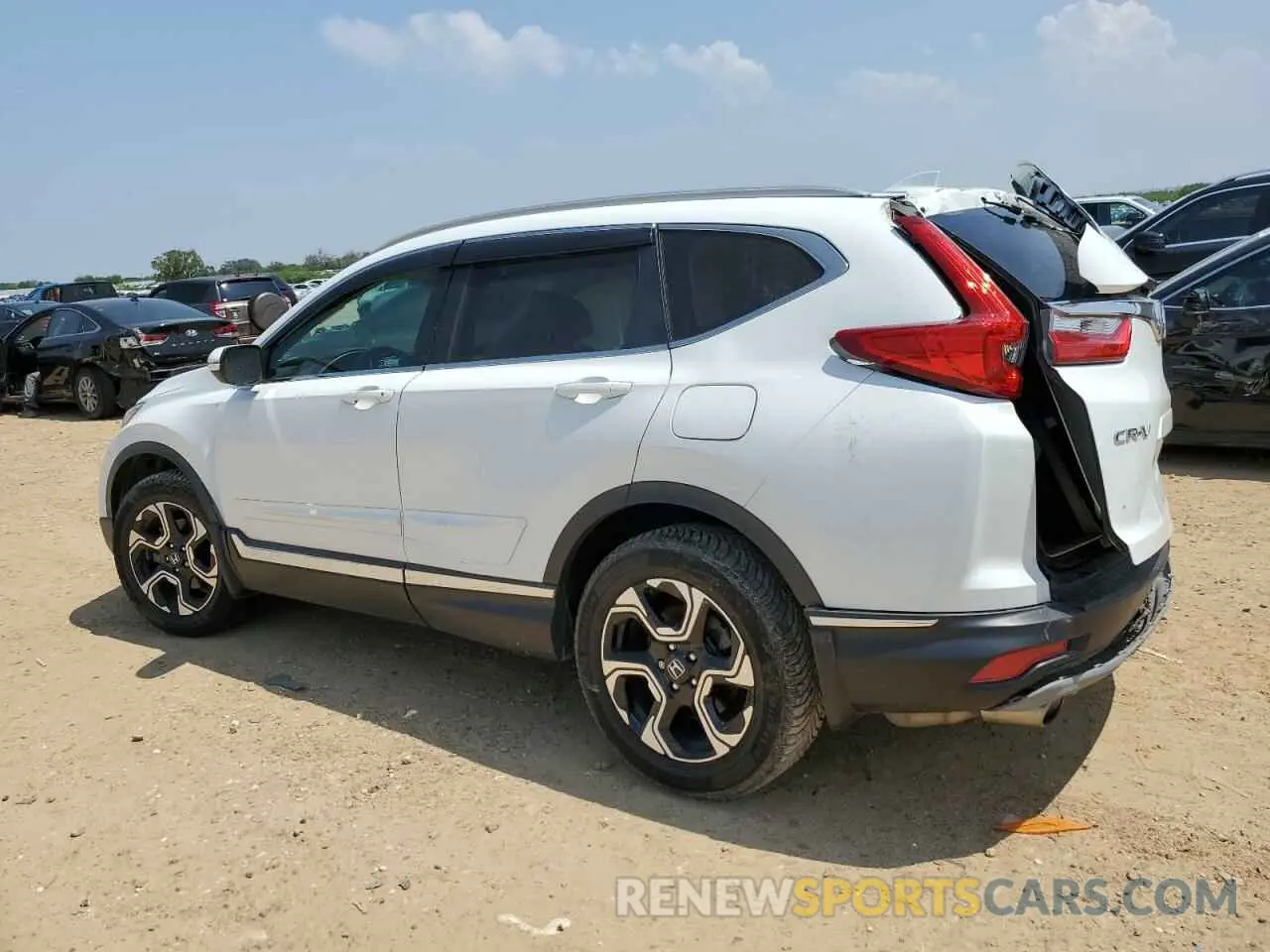 2 fotografías del automóvil dañado 2HKRW2H93KH642660 HONDA CRV 2019