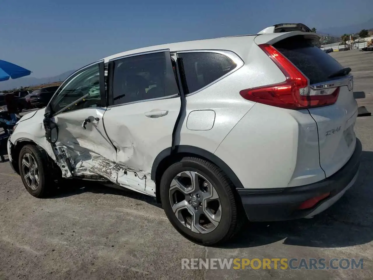 2 fotografías del automóvil dañado 5J6RW1H53KA025574 HONDA CRV 2019