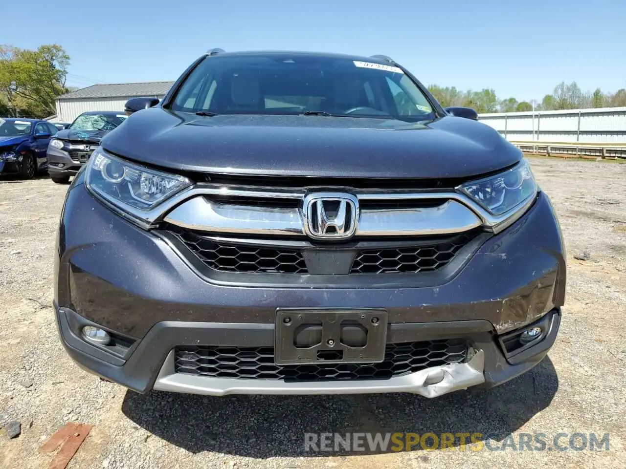 5 fotografías del automóvil dañado 5J6RW2H57KL025023 HONDA CRV 2019