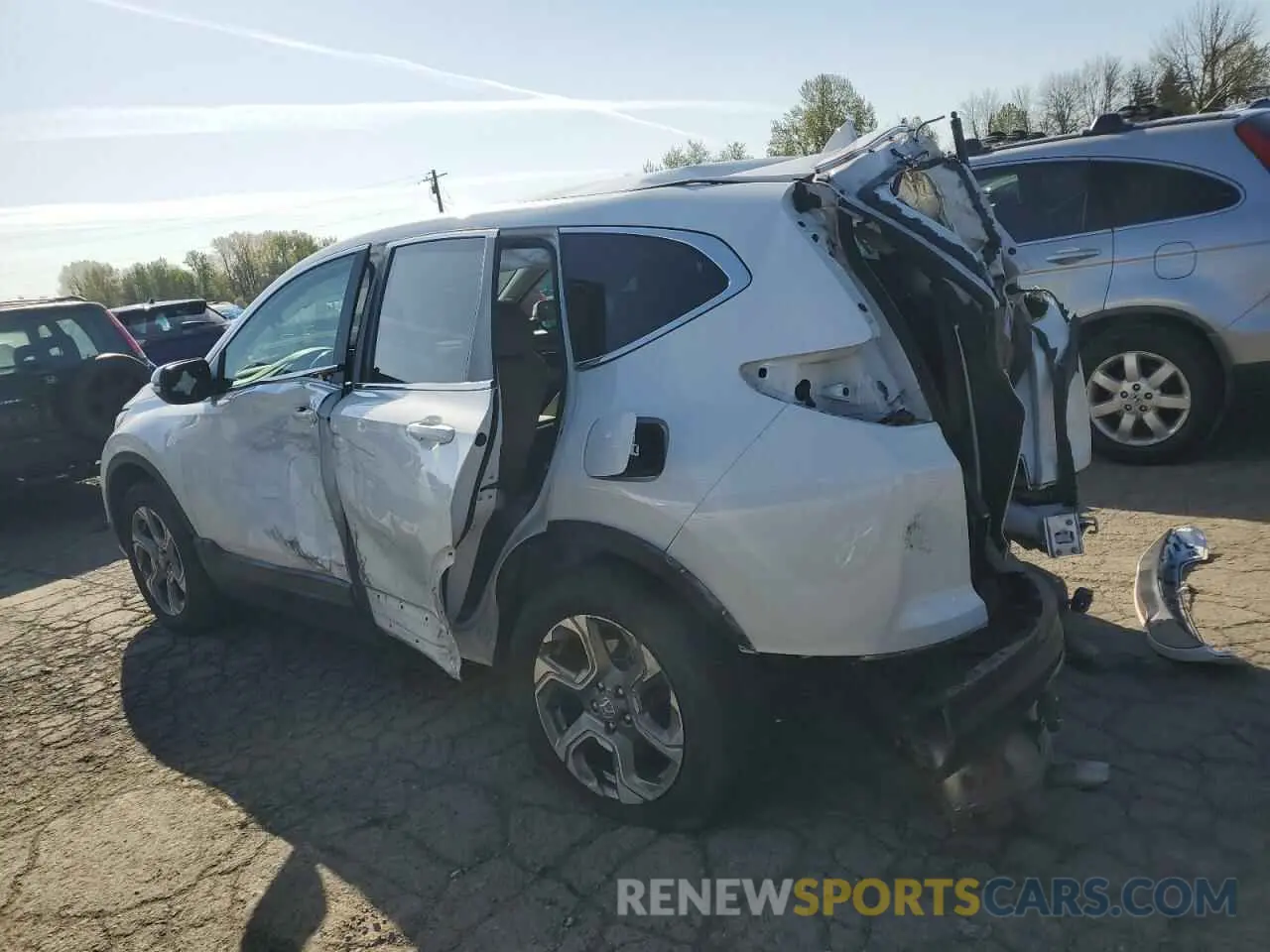 2 fotografías del automóvil dañado 5J6RW2H88KA017244 HONDA CRV 2019