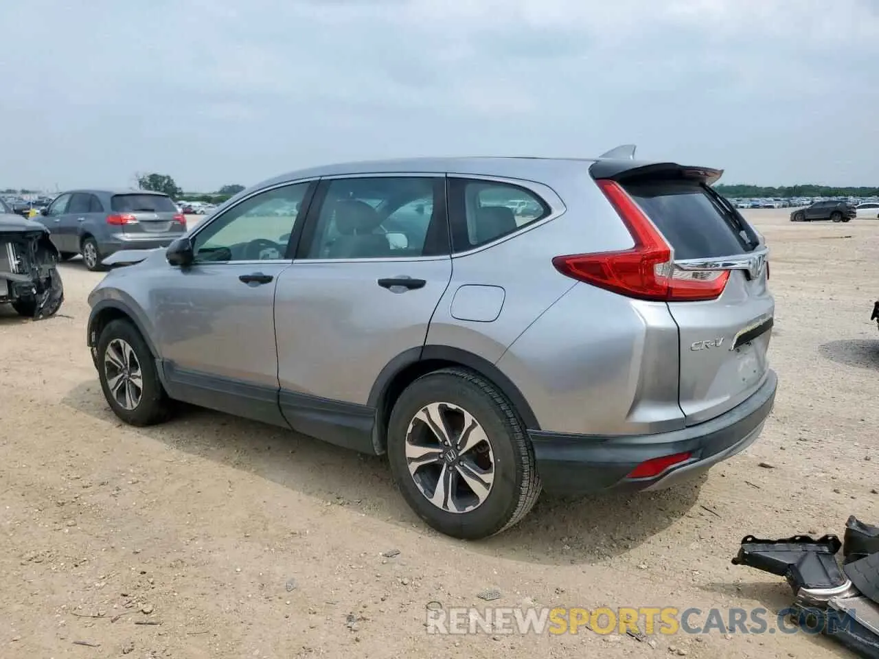 2 fotografías del automóvil dañado 5J6RW5H33KL000779 HONDA CRV 2019