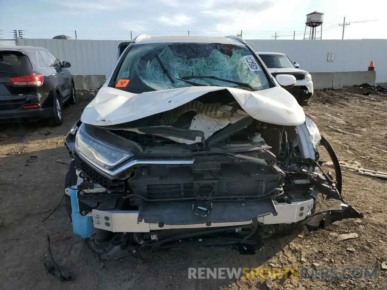5 fotografías del automóvil dañado 5J6RT6H94NL054535 HONDA CRV 2022