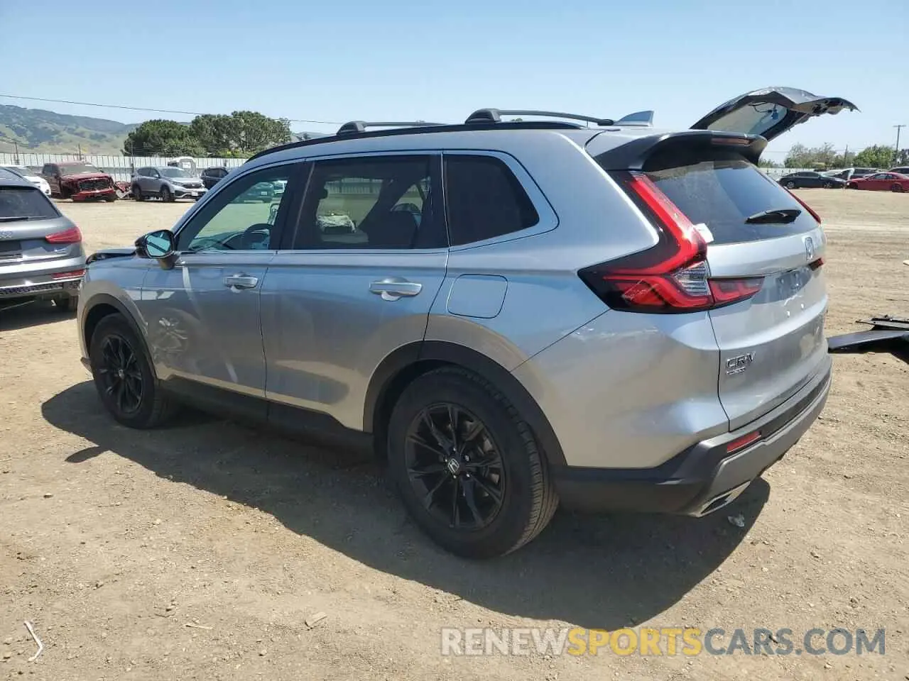 2 fotografías del automóvil dañado 2HKRS5H51PH712335 HONDA CRV 2023