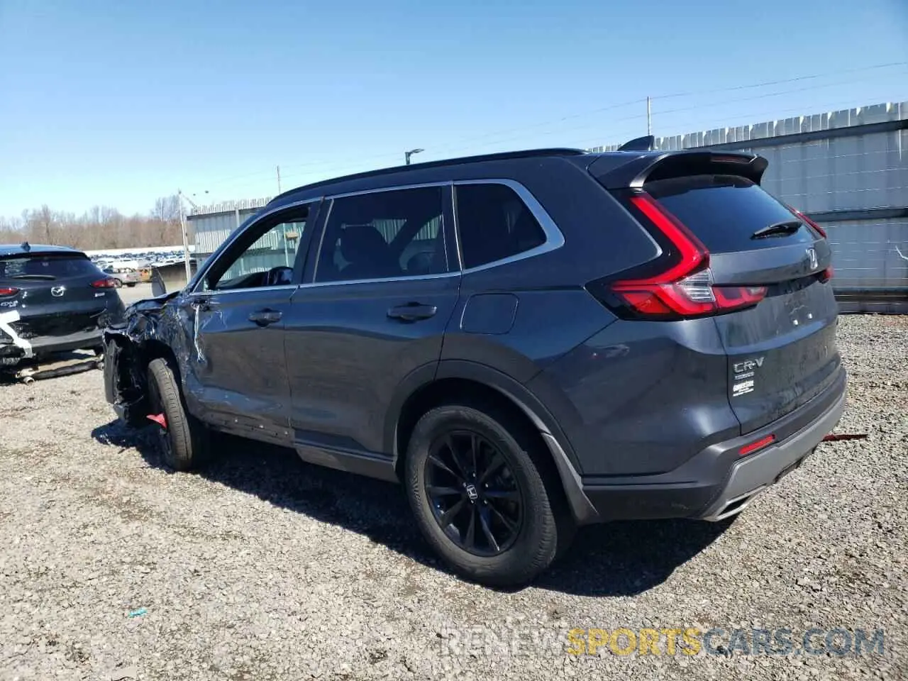 2 fotografías del automóvil dañado 2HKRS6H53PH813267 HONDA CRV 2023