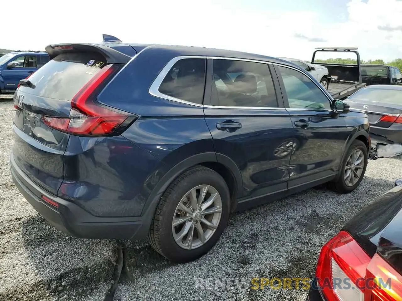 3 fotografías del automóvil dañado 5J6RS3H75PL008019 HONDA CRV 2023