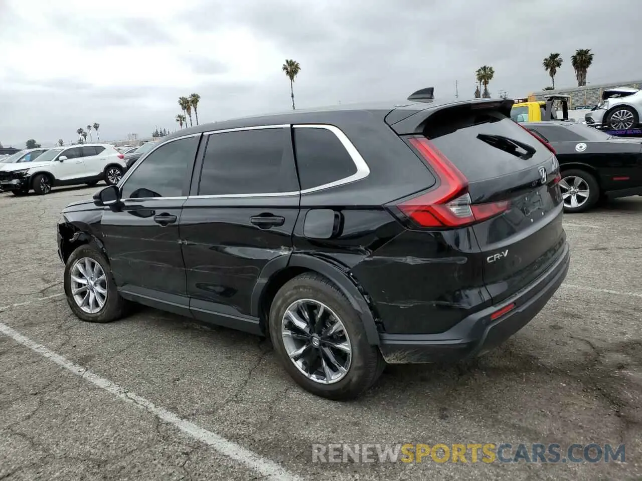 2 fotografías del automóvil dañado 2HKRS3H79RH324889 HONDA CRV 2024