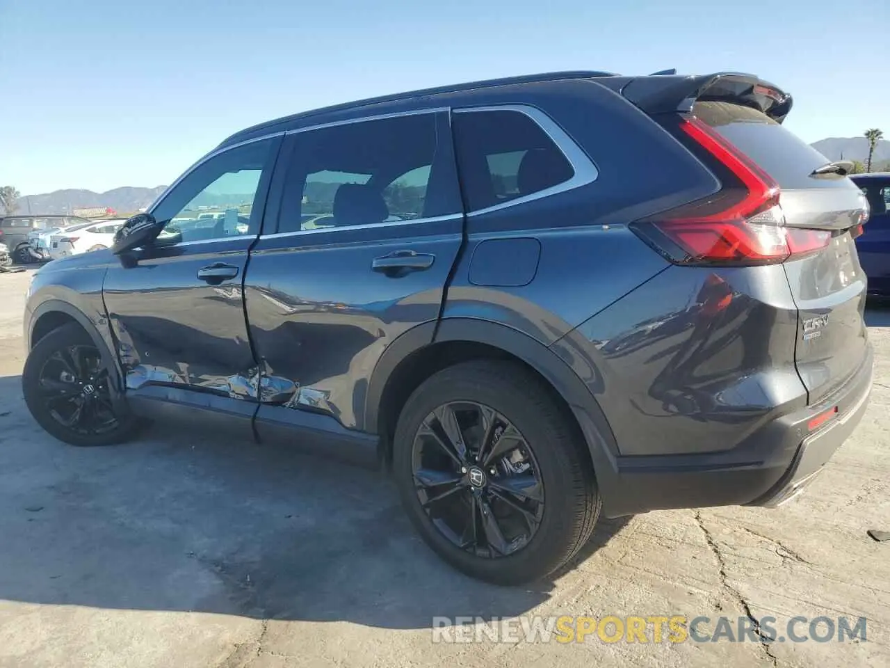 2 fotografías del automóvil dañado 2HKRS6H90RH809148 HONDA CRV 2024