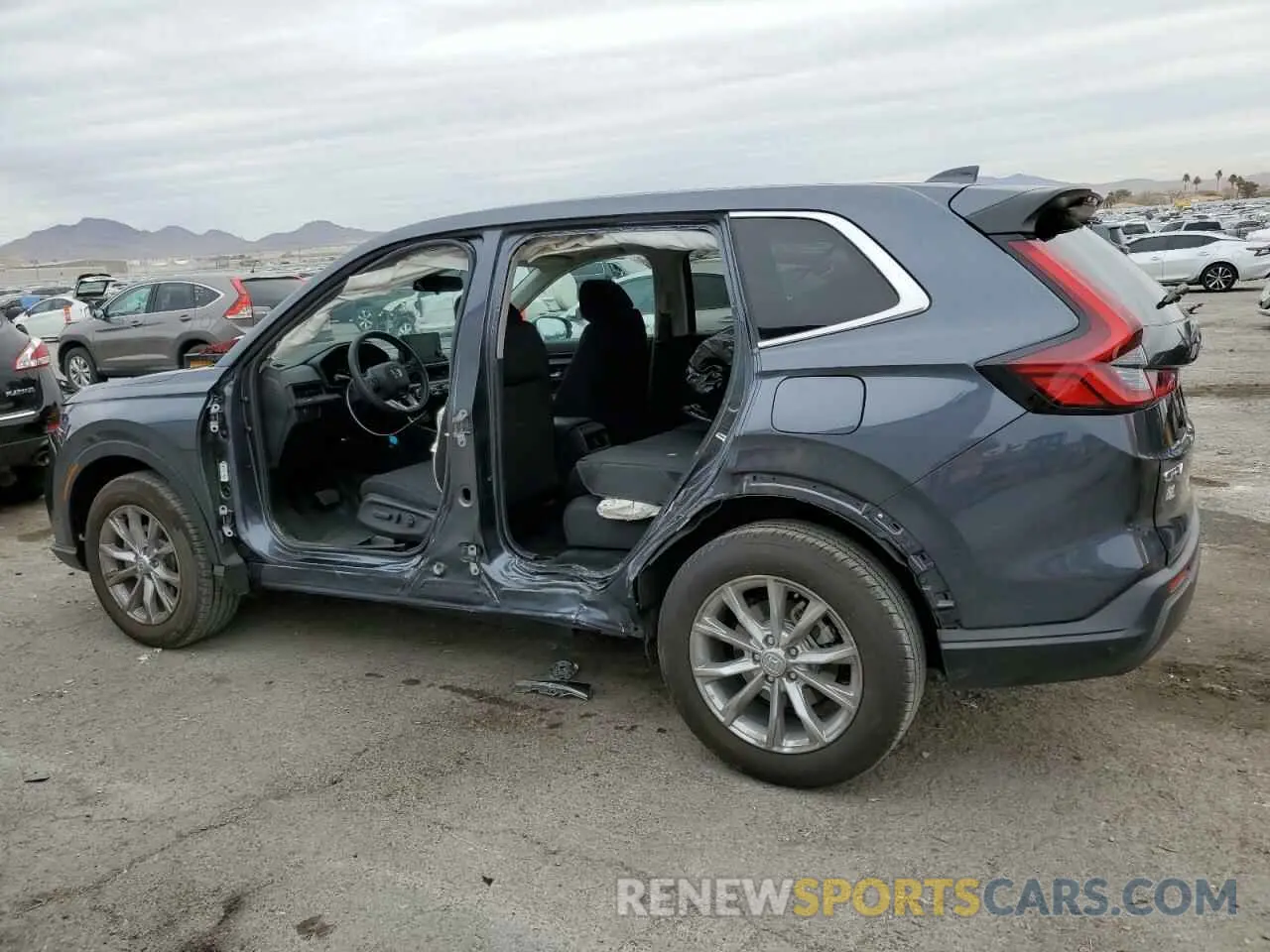 2 fotografías del automóvil dañado 2HKRS4H48SH418344 HONDA CRV 2025